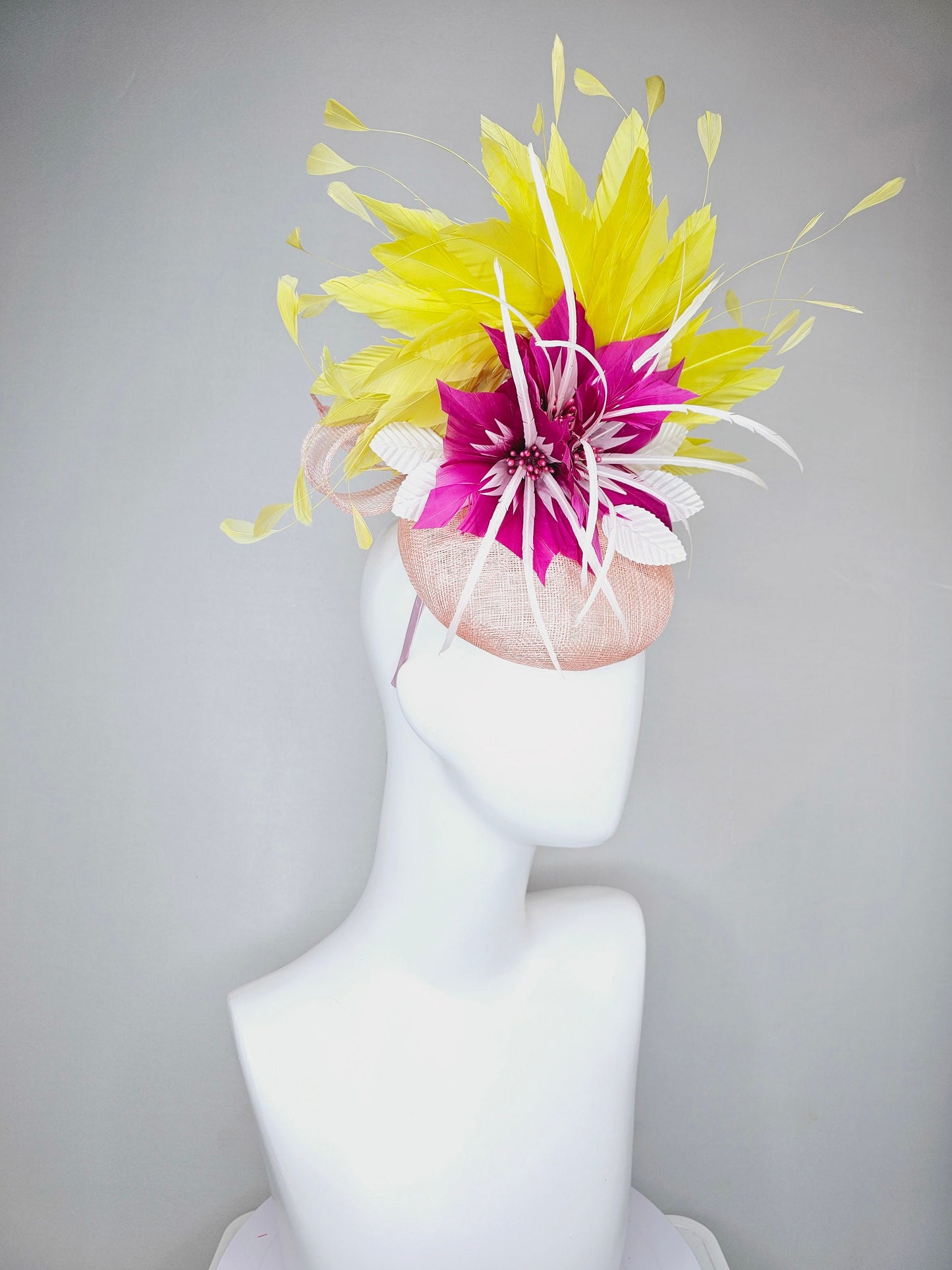 kentucky derby hat fascinator light pink sinamay with large fuchsia pink and white feather flowers,and branching bright yellow feathers