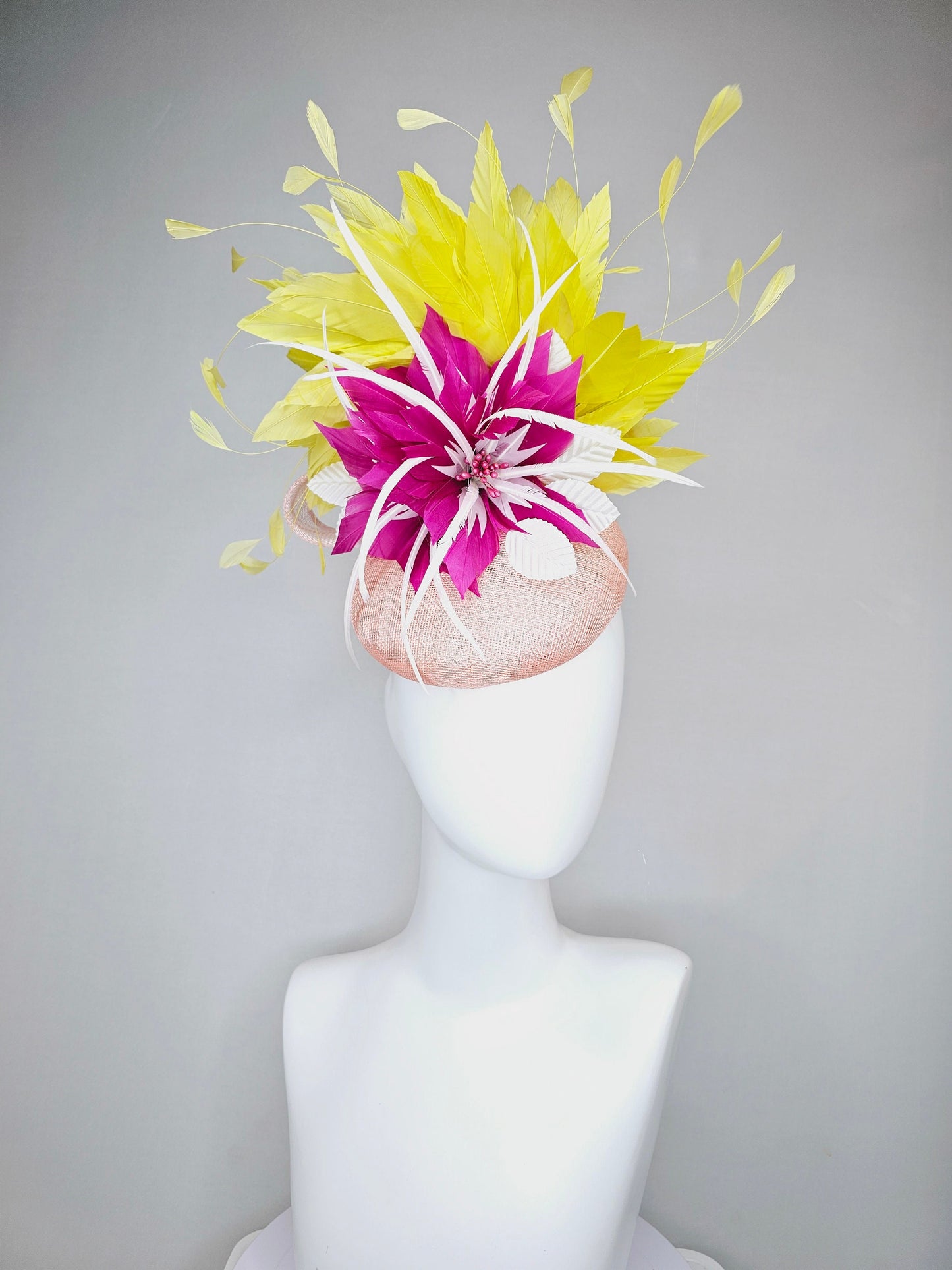 kentucky derby hat fascinator light pink sinamay with large fuchsia pink and white feather flowers,and branching bright yellow feathers