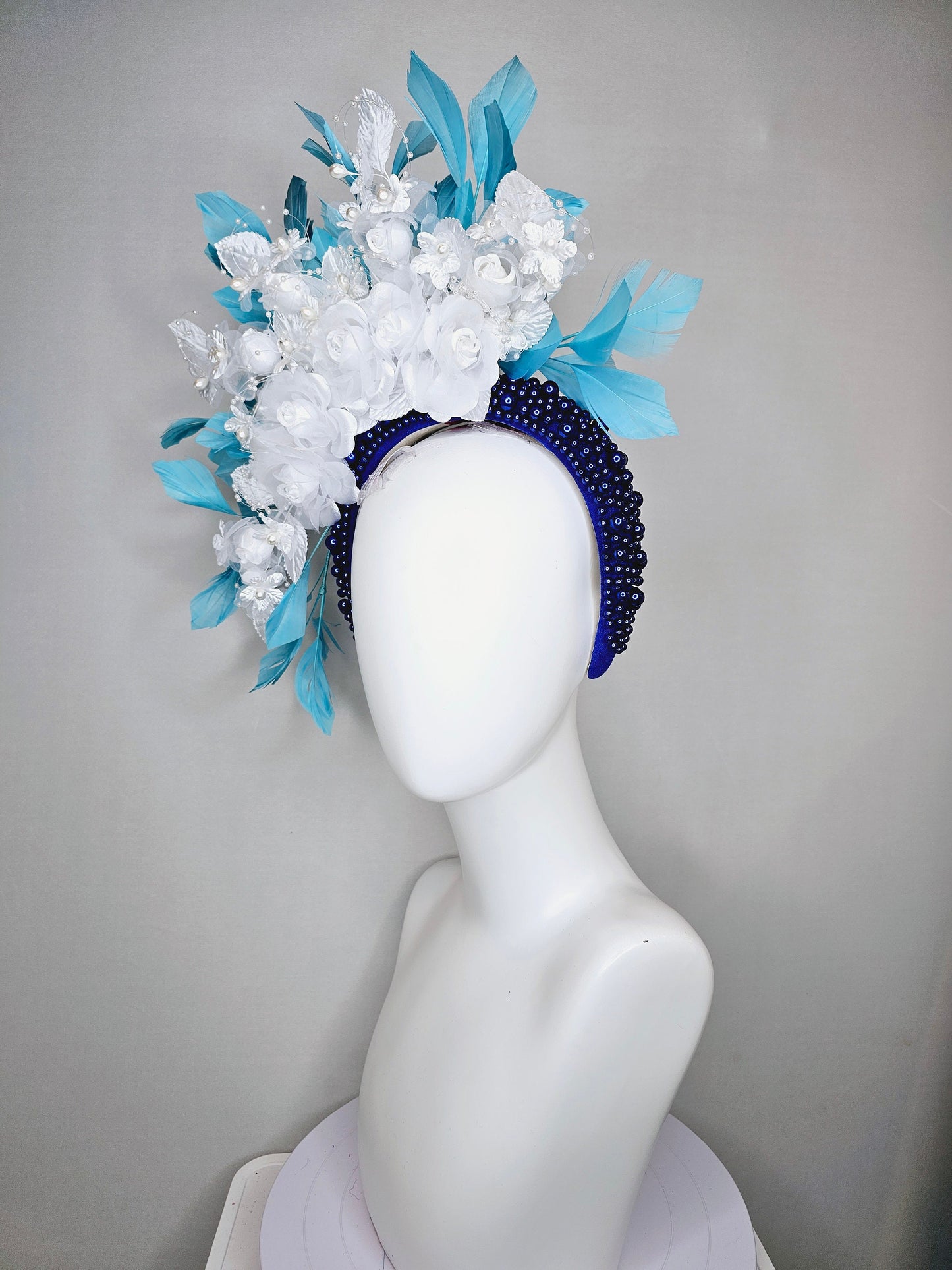 kentucky derby hat fascinator midnight blue pearl beaded headband with sky blue feathers and white organza satin flowers and pearl strings