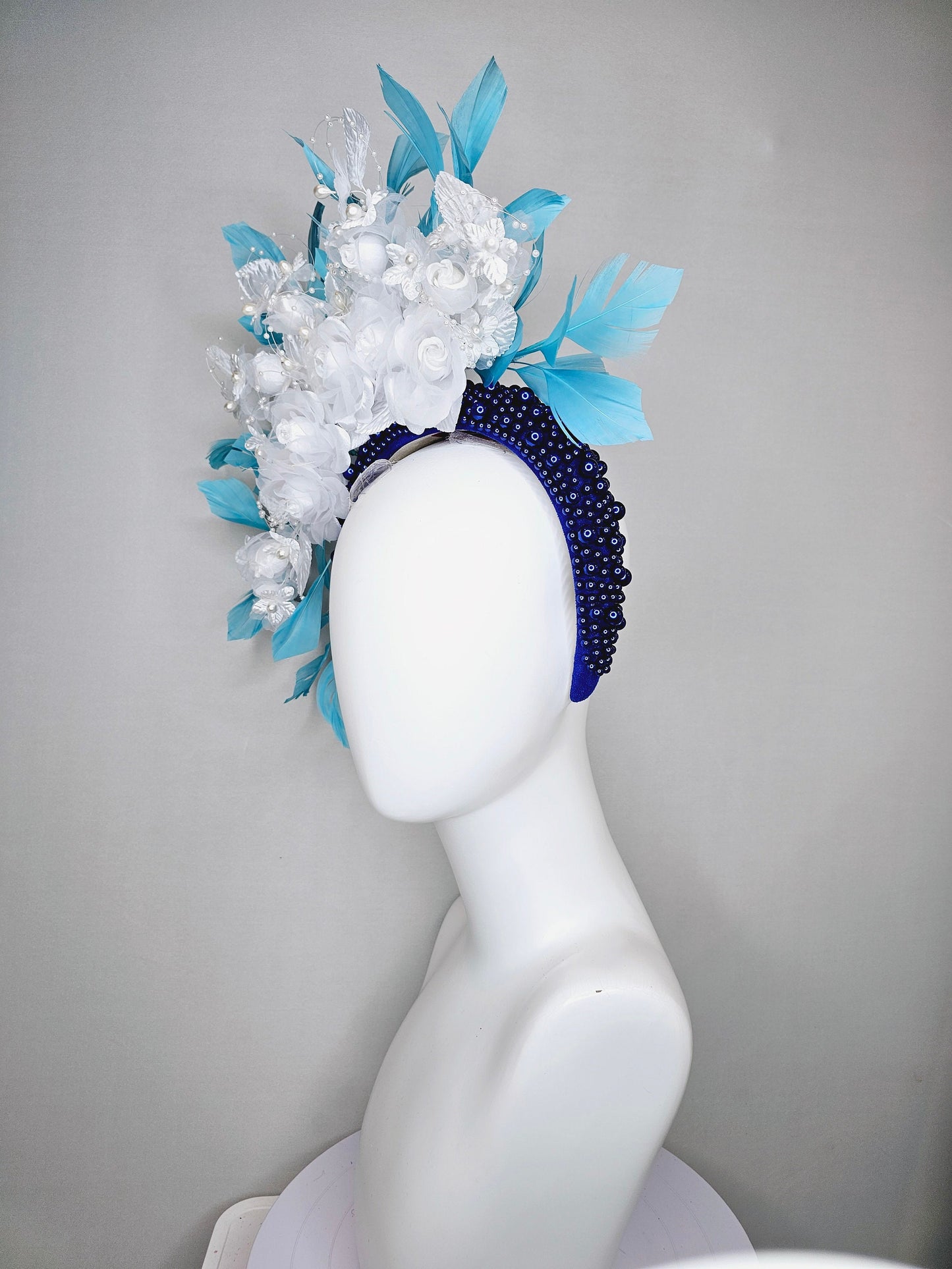 kentucky derby hat fascinator midnight blue pearl beaded headband with sky blue feathers and white organza satin flowers and pearl strings