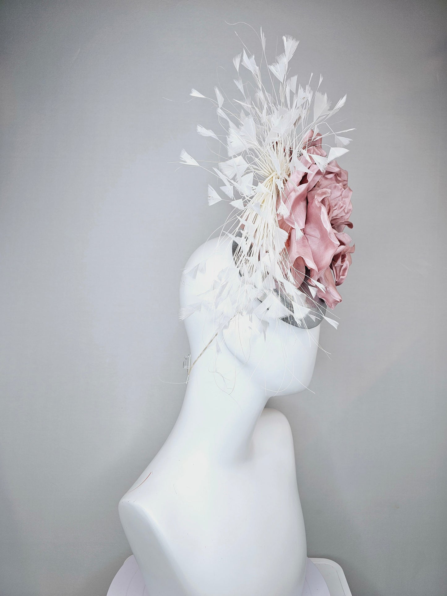 kentucky derby hat fascinator silver metallic with large blush pink satin flower and pink velvet leaves, white branching feathers