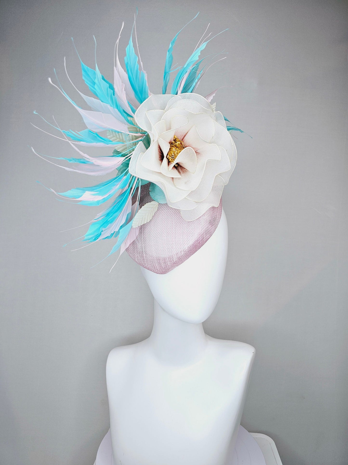 kentucky derby hat fascinator blush light pink sinamay with aqua turquoise blue white feathers and large ivory cream flower with gold core