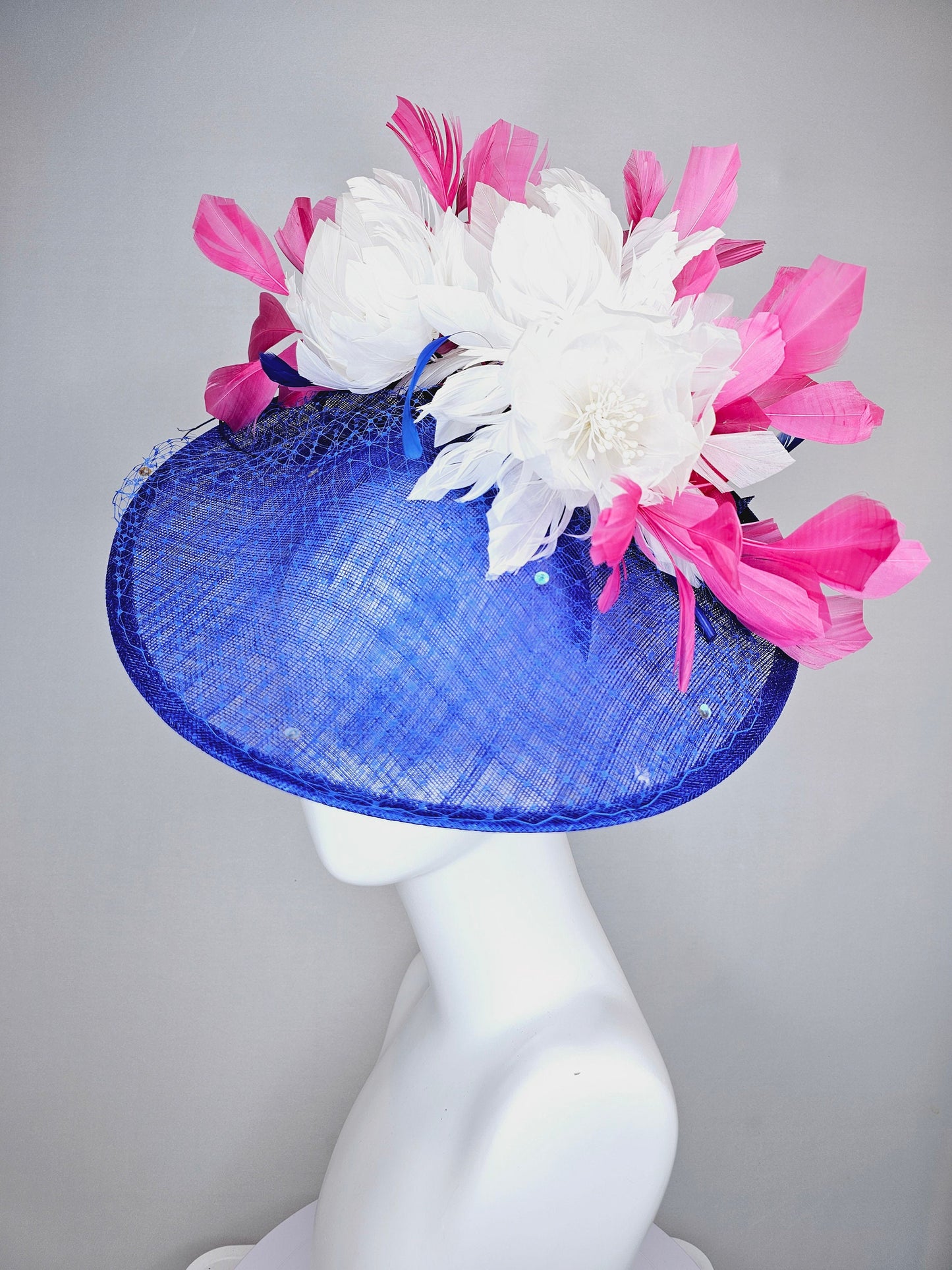 kentucky derby hat fascinator royal blue saucer with netting and sequin,white fluffy feather flowers and branching pink feathers