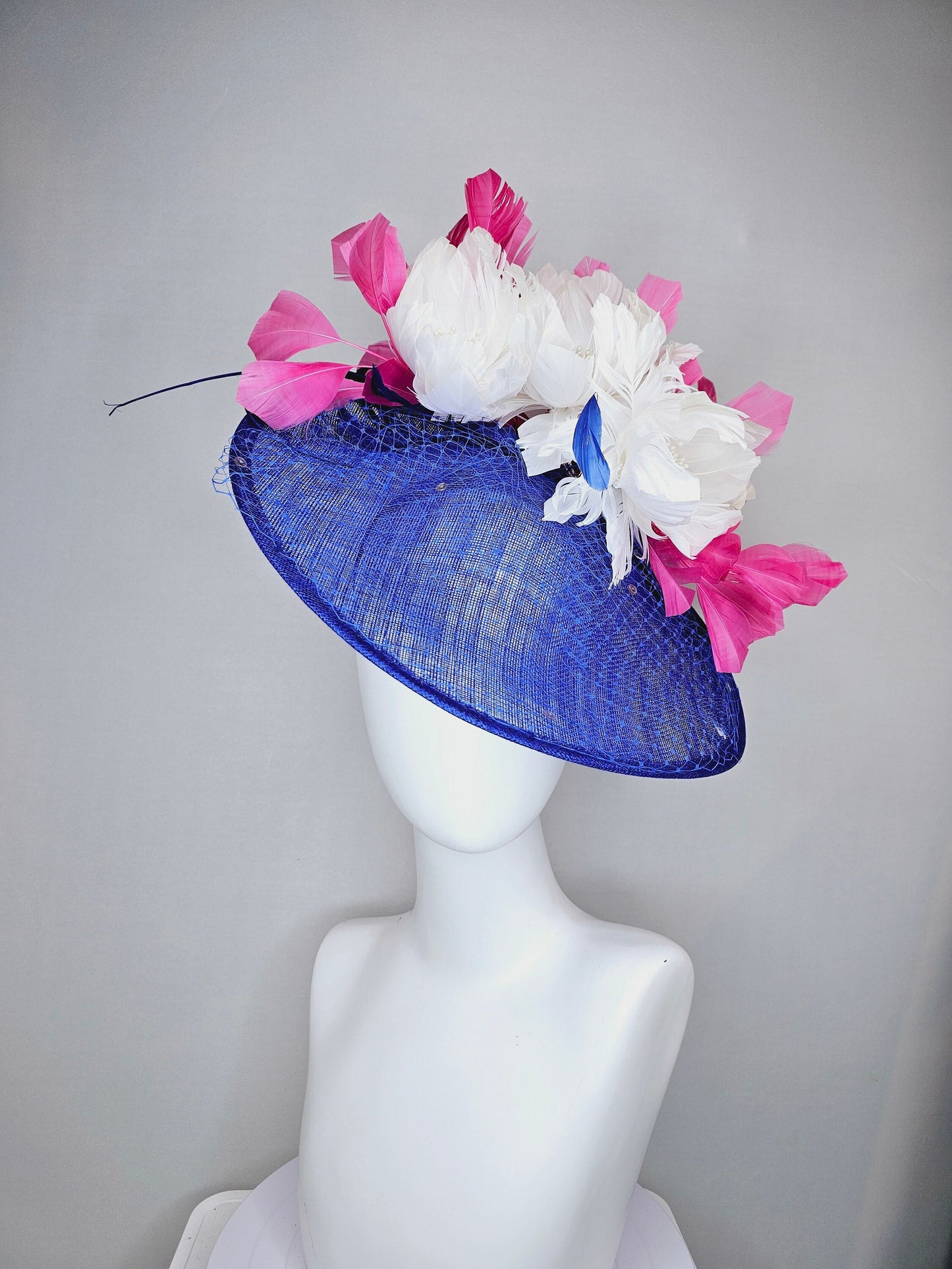 kentucky derby hat fascinator royal blue saucer with netting and sequin,white fluffy feather flowers and branching pink feathers