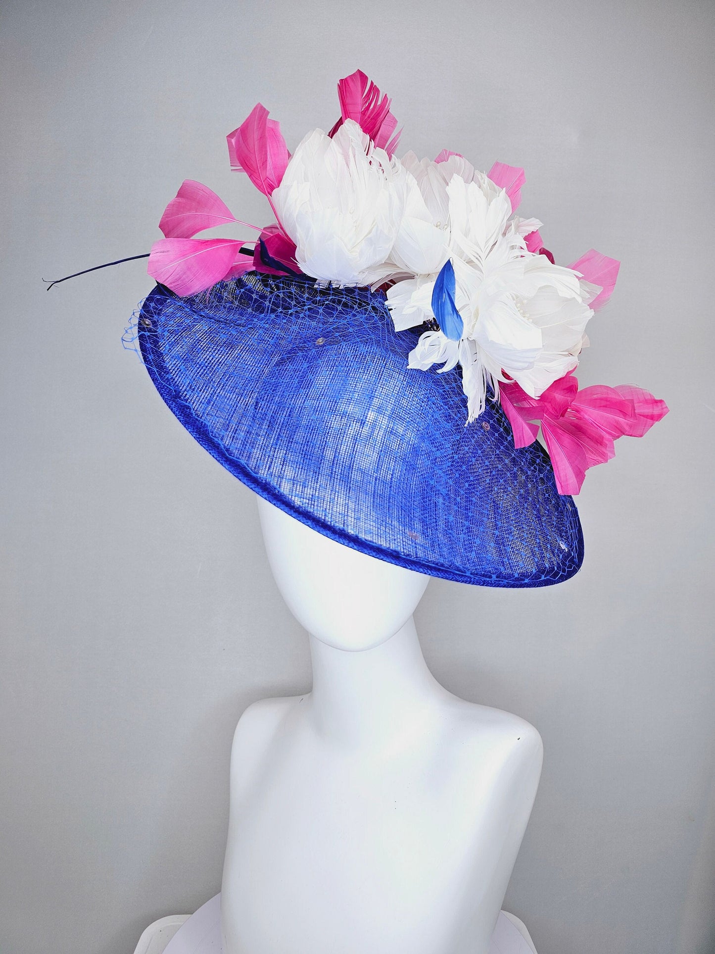 kentucky derby hat fascinator royal blue saucer with netting and sequin,white fluffy feather flowers and branching pink feathers