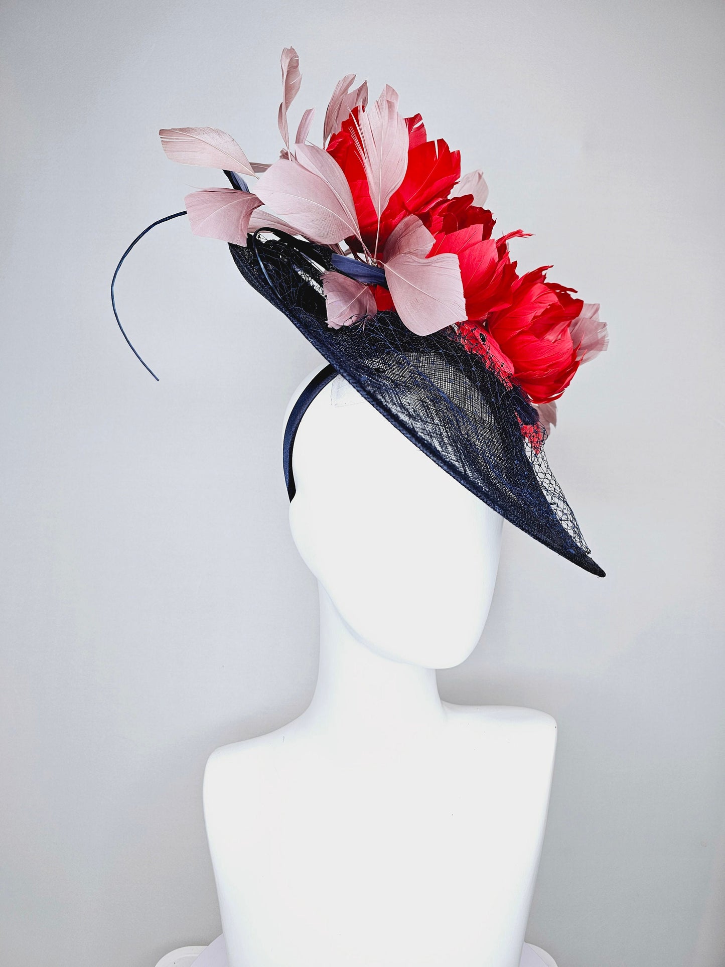 kentucky derby hat fascinator midnight navy blue sinamay saucer with netting and sequin,red fluffy feather flowers and blush taupe feathers