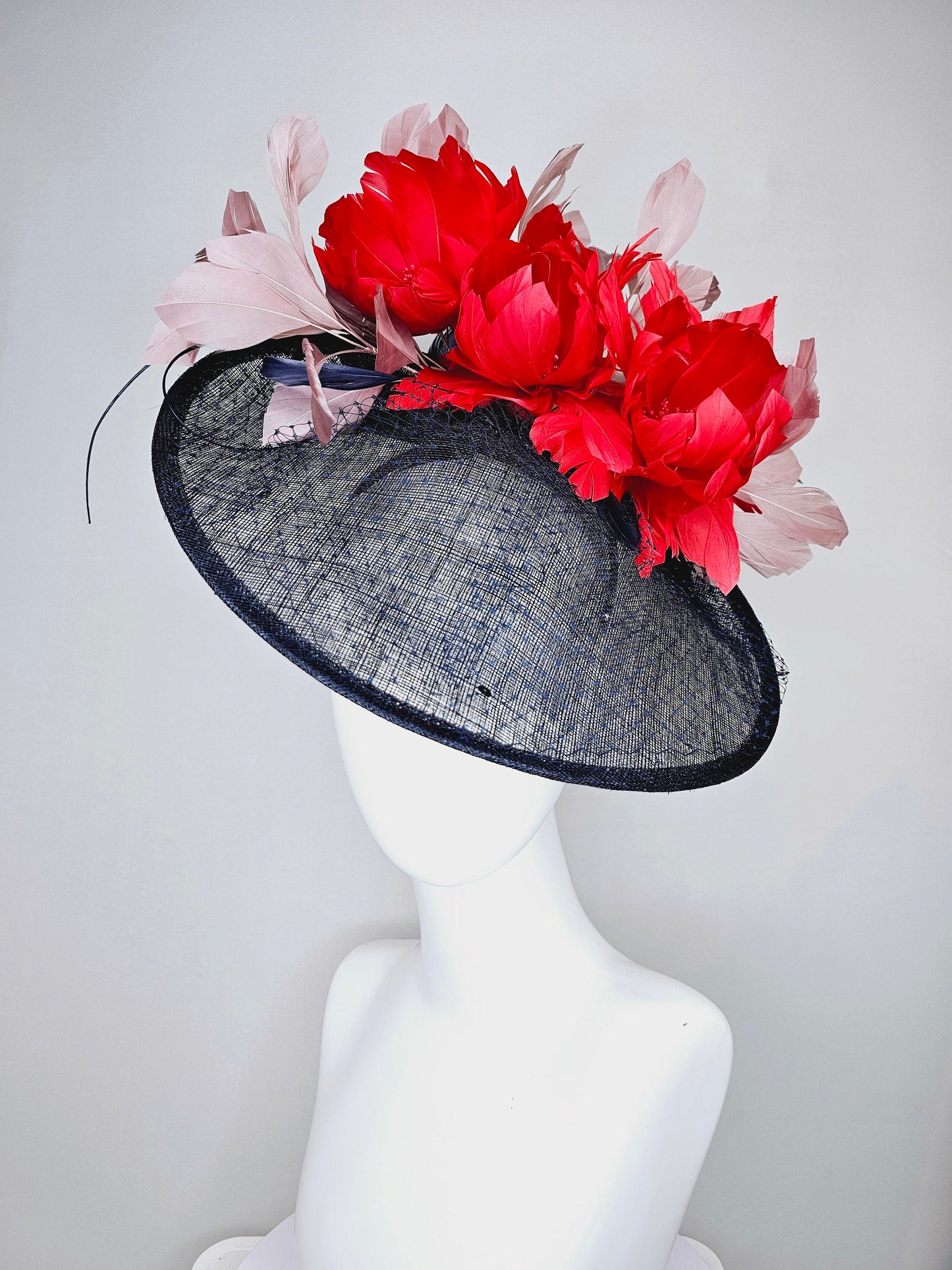 kentucky derby hat fascinator midnight navy blue sinamay saucer with netting and sequin,red fluffy feather flowers and blush taupe feathers