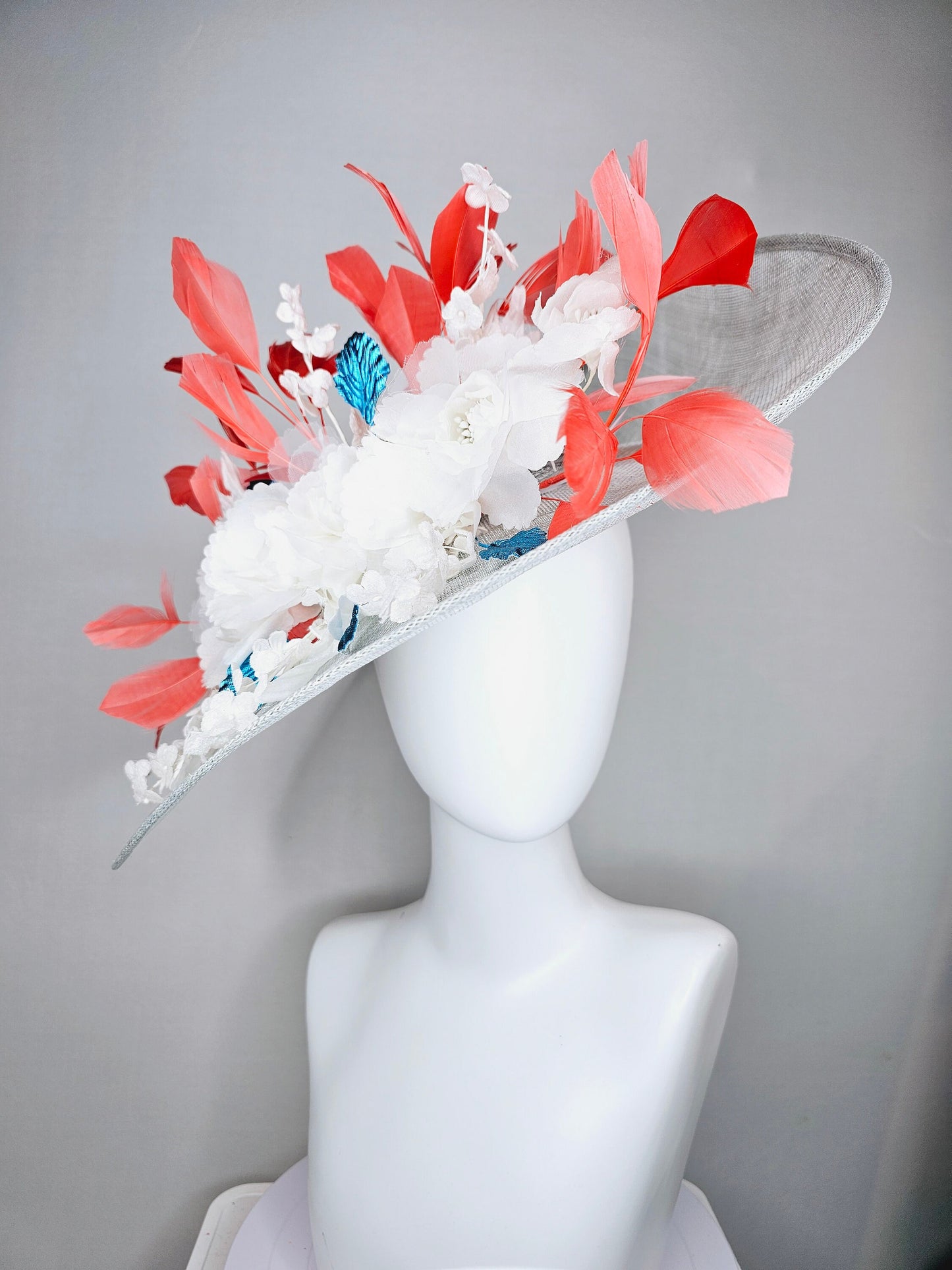 kentucky derby hat large wide brim sinamay gray hat with white ivory organza flowers and blue leaves with coral orange branching feathers