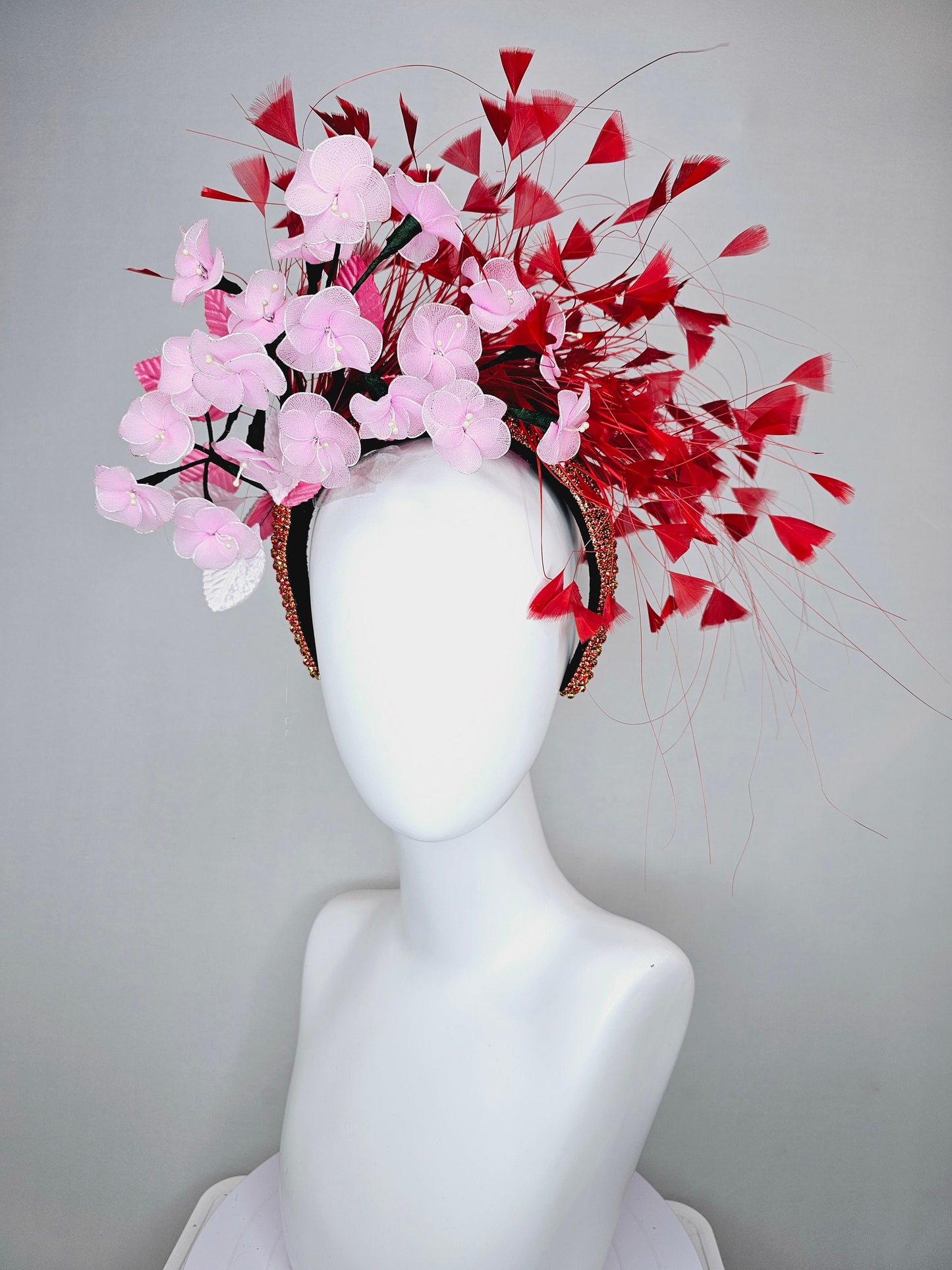 kentucky derby hat fascinator red rhinestone crystal headband,light pink wire mesh flowers,pink velvet leaves,and red branching feathers