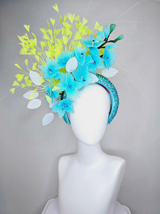 kentucky derby hat fascinator turquoise blue crystal rhinestone headband with sky blue wire mesh flowers,white leaves, and yellow feathers