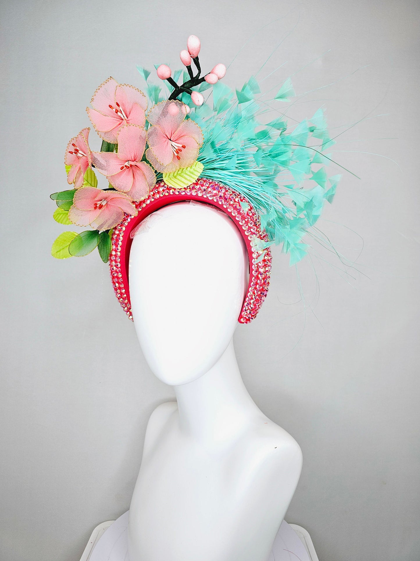 kentucky derby hat fascinator turquoise blue feathers on iridescent crystal coral headband with peach pink wire mesh flowers,green leaves