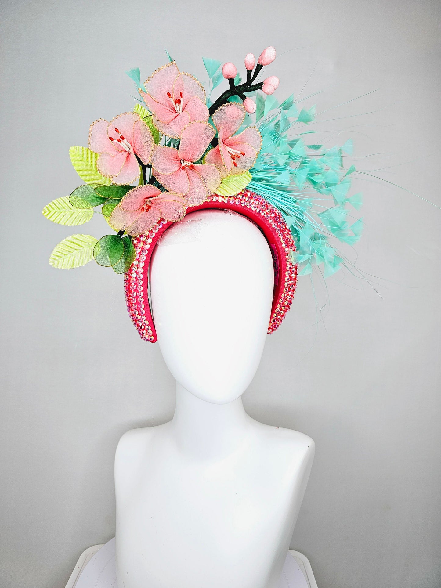 kentucky derby hat fascinator turquoise blue feathers on iridescent crystal coral headband with peach pink wire mesh flowers,green leaves