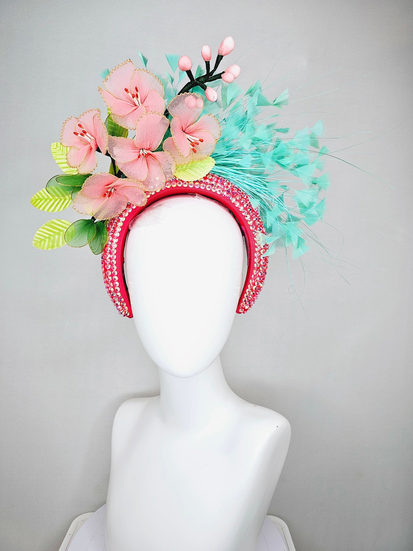 kentucky derby hat fascinator turquoise blue feathers on iridescent crystal coral headband with peach pink wire mesh flowers,green leaves