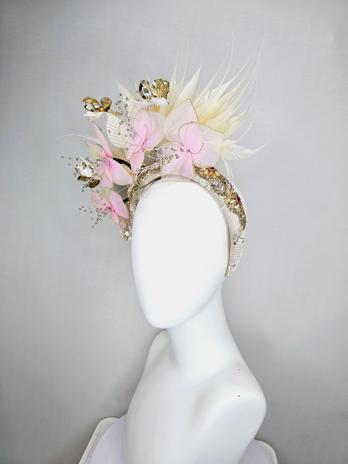 kentucky derby hat fascinator light pink and gold flowers with ivory cream feathers on champagne crystal gold rhinestone beaded headband