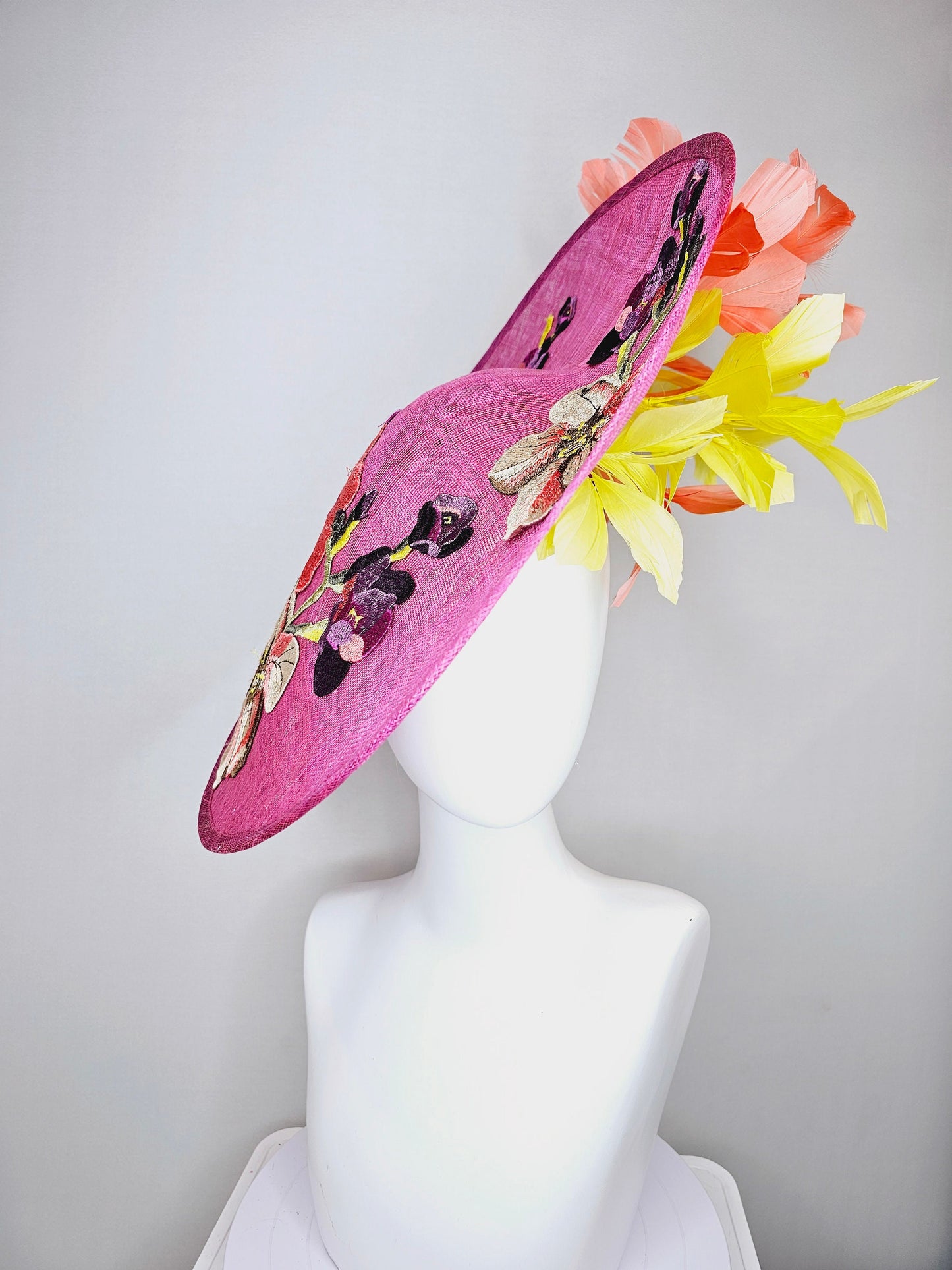 kentucky derby hat fascinator large pink sinamay saucer with yellow coral purple pink ivory embroidered flowers and orange yellow feathers