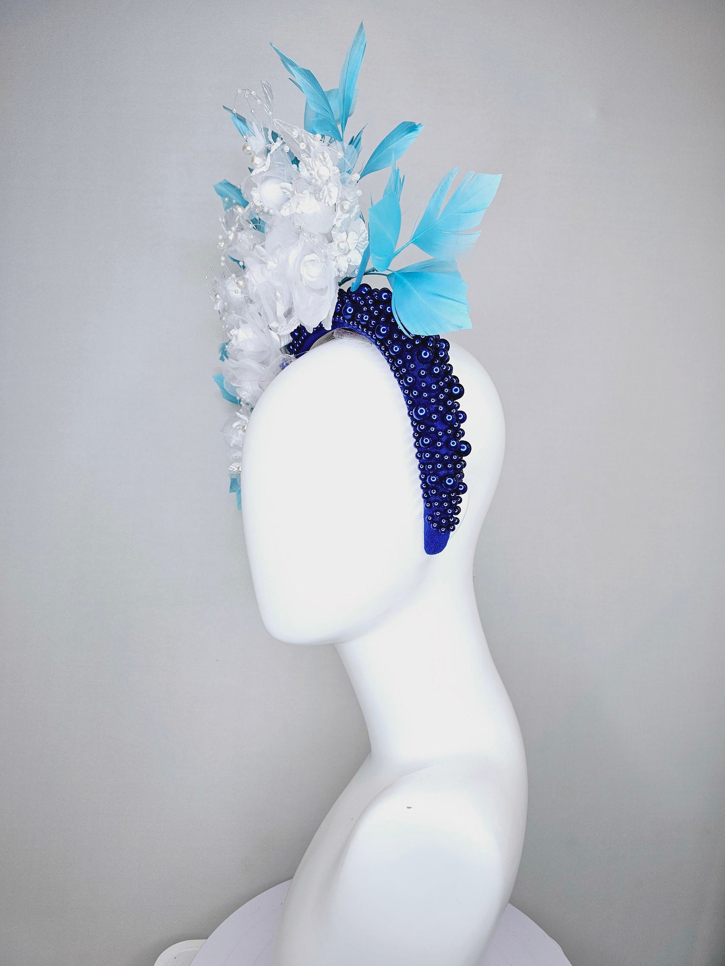 kentucky derby hat fascinator midnight blue pearl beaded headband with sky blue feathers and white organza satin flowers and pearl strings