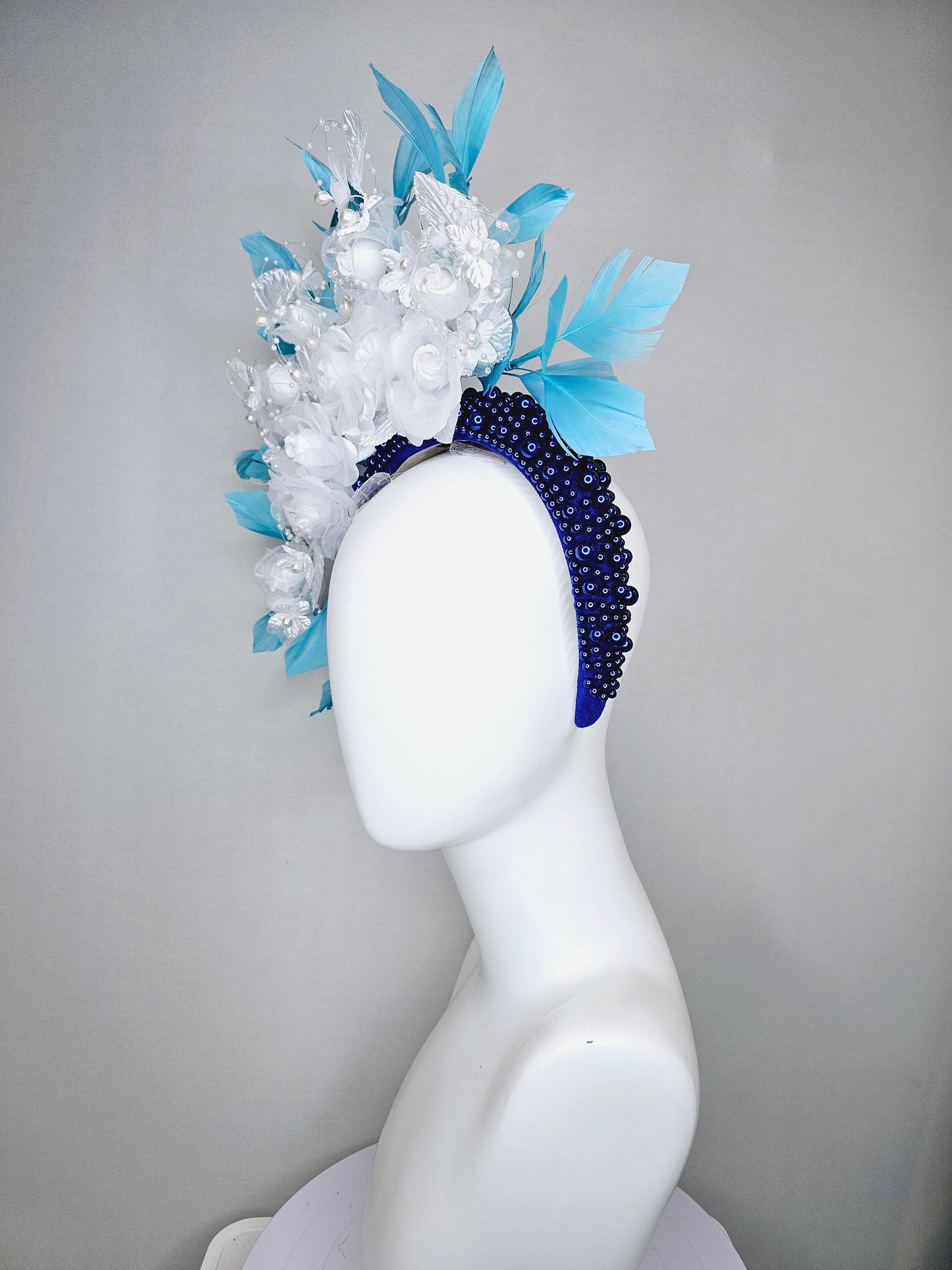 kentucky derby hat fascinator midnight blue pearl beaded headband with sky blue feathers and white organza satin flowers and pearl strings