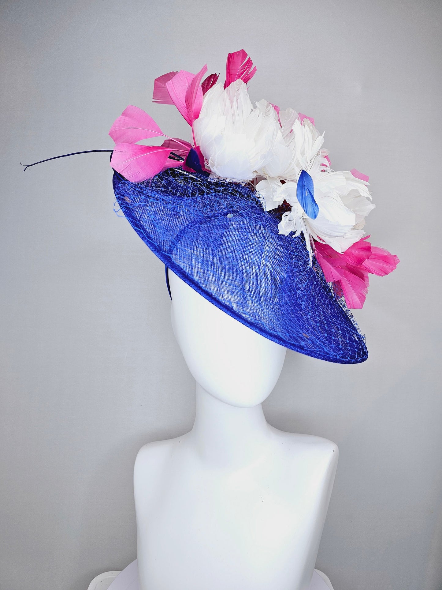 kentucky derby hat fascinator royal blue saucer with netting and sequin,white fluffy feather flowers and branching pink feathers