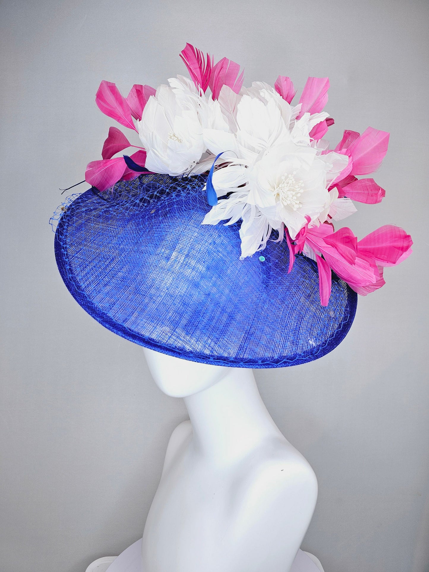 kentucky derby hat fascinator royal blue saucer with netting and sequin,white fluffy feather flowers and branching pink feathers