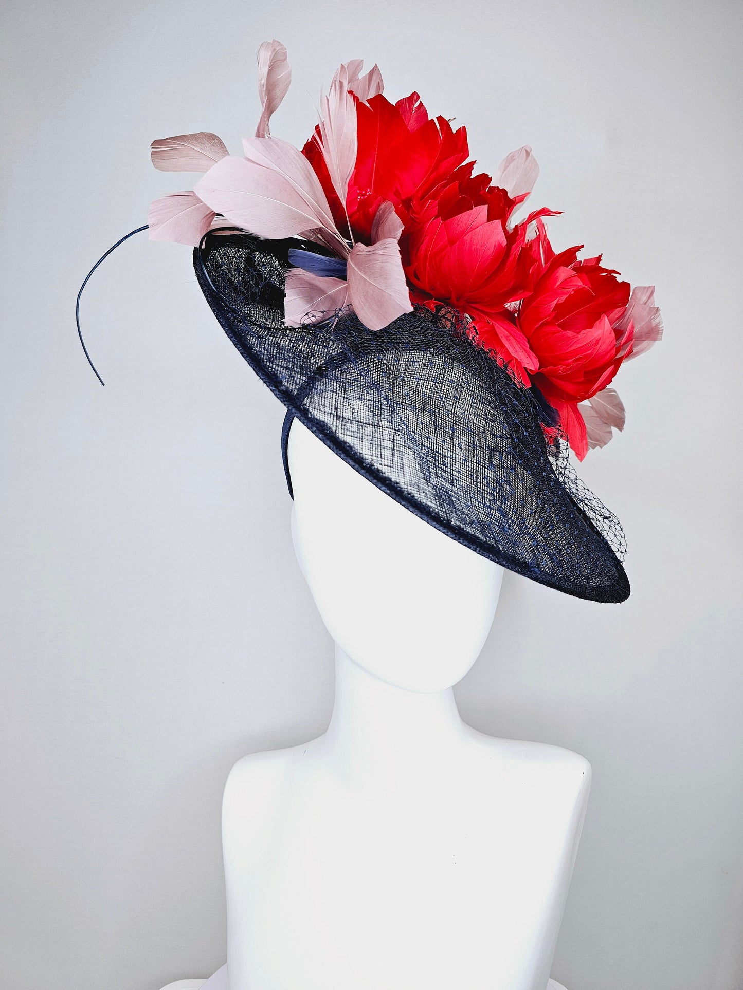 kentucky derby hat fascinator midnight navy blue sinamay saucer with netting and sequin,red fluffy feather flowers and blush taupe feathers