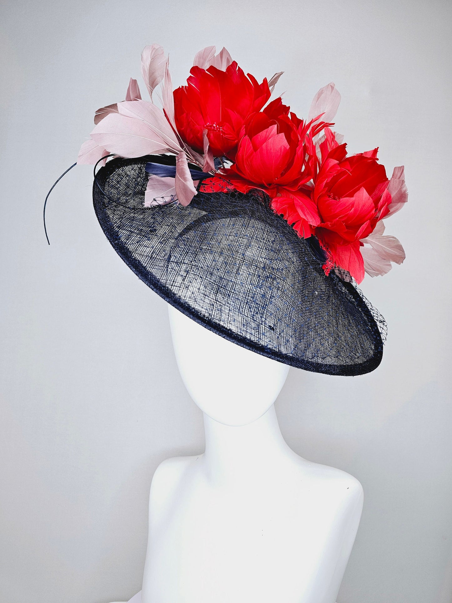 kentucky derby hat fascinator midnight navy blue sinamay saucer with netting and sequin,red fluffy feather flowers and blush taupe feathers