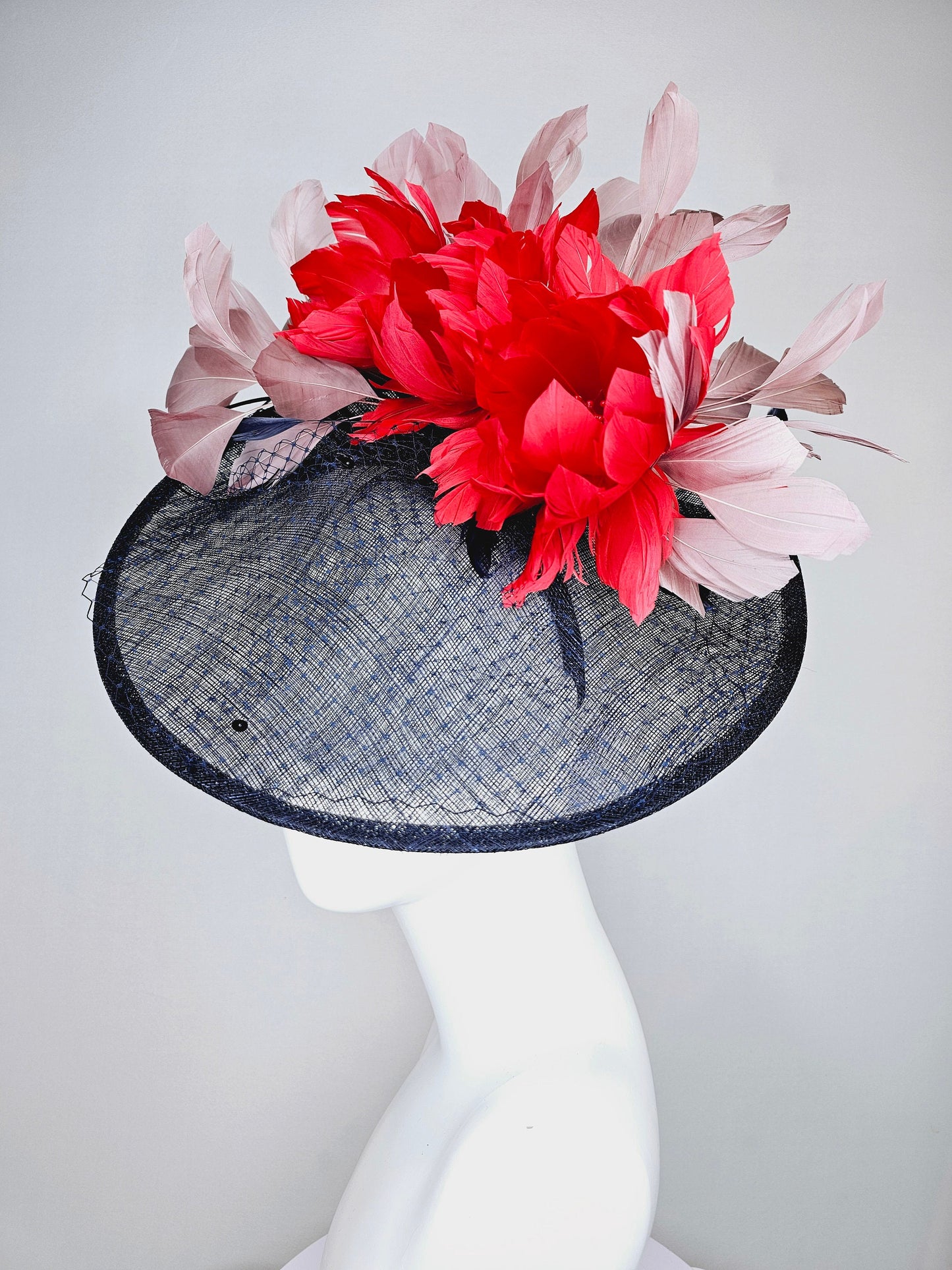 kentucky derby hat fascinator midnight navy blue sinamay saucer with netting and sequin,red fluffy feather flowers and blush taupe feathers