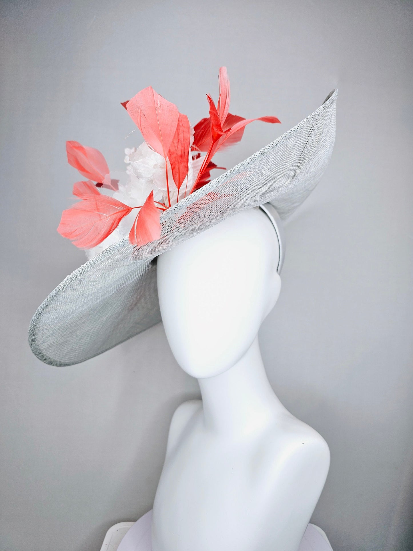 kentucky derby hat large wide brim sinamay gray hat with white ivory organza flowers and blue leaves with coral orange branching feathers