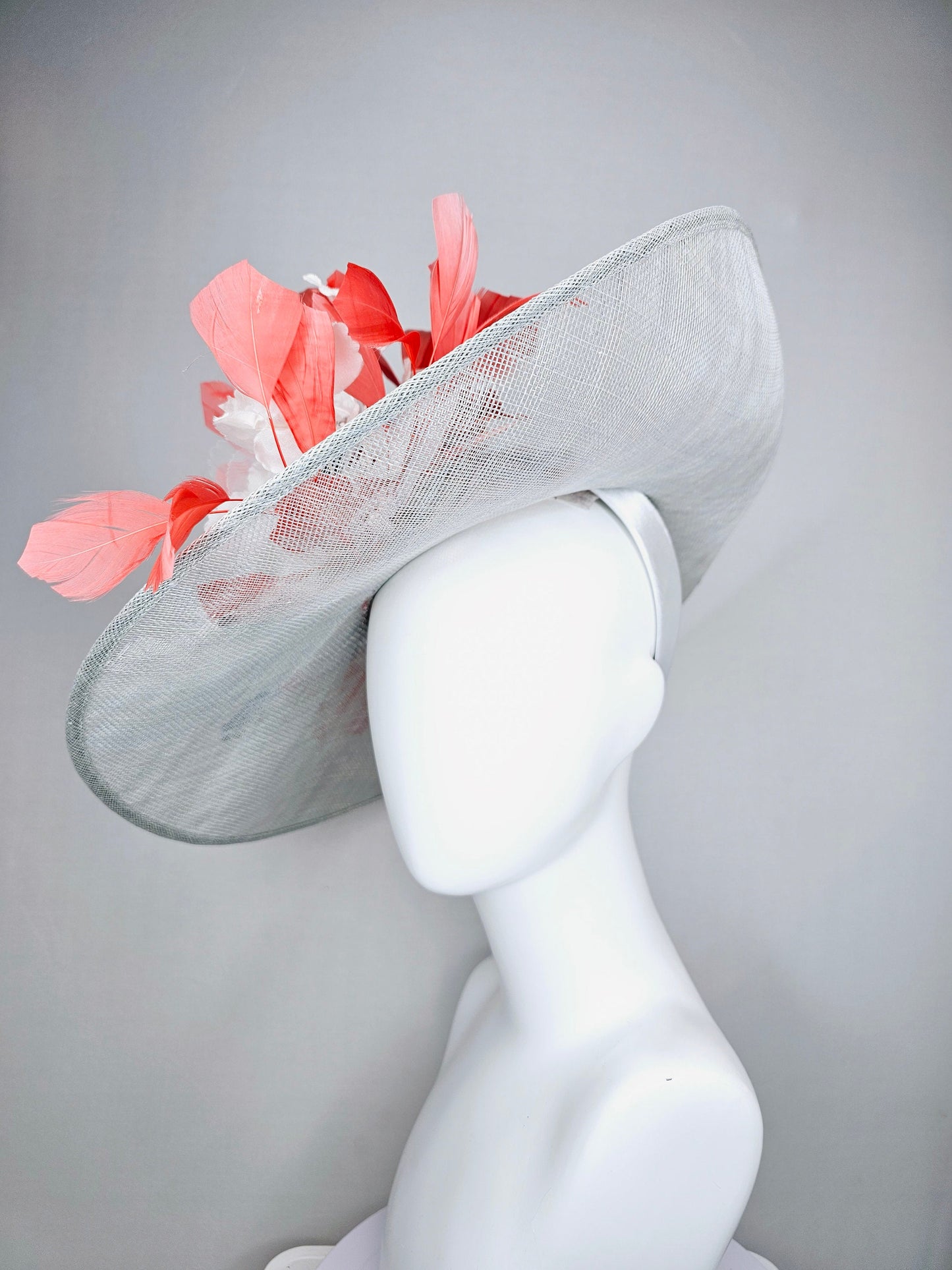 kentucky derby hat large wide brim sinamay gray hat with white ivory organza flowers and blue leaves with coral orange branching feathers