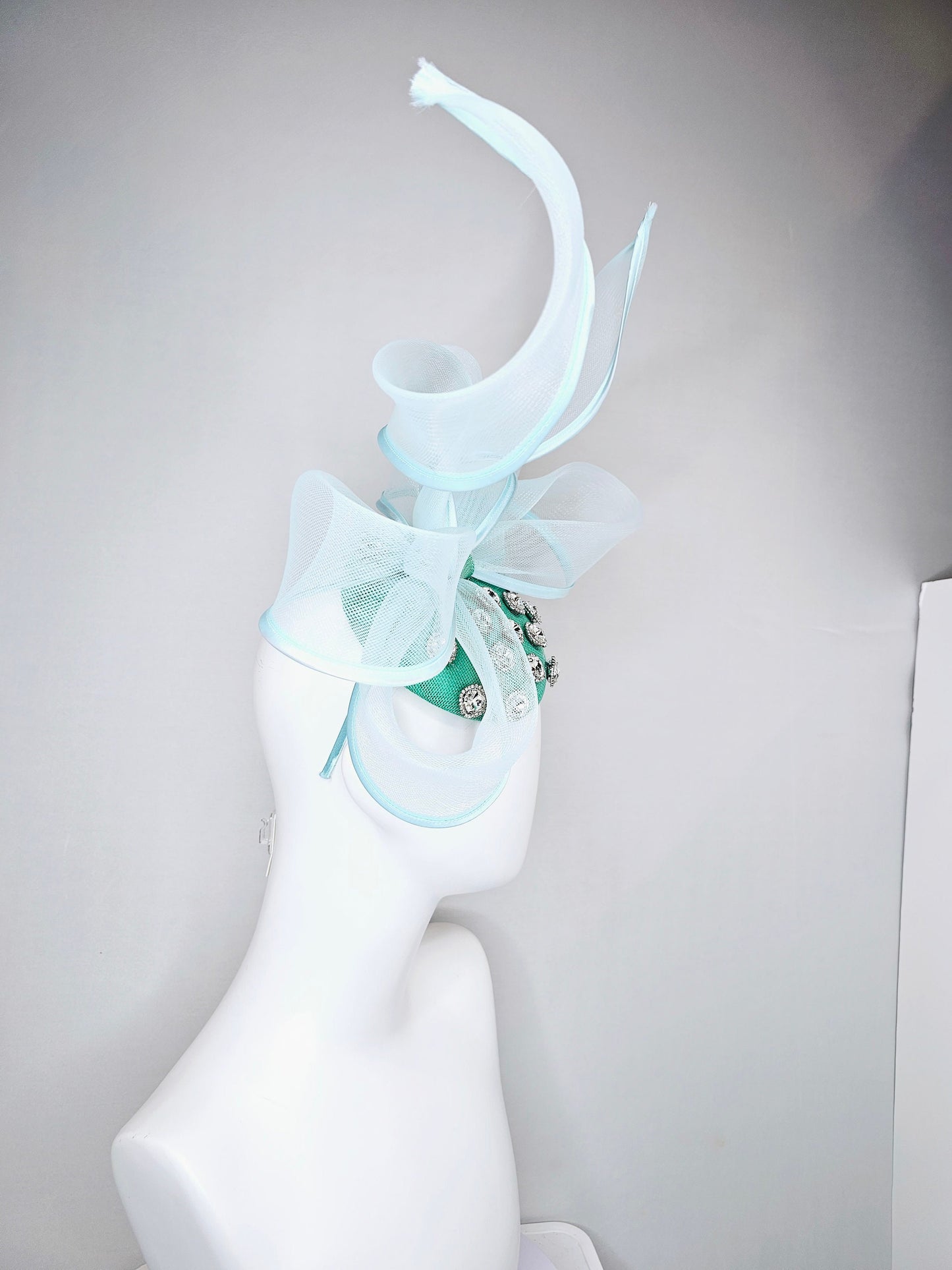 kentucky derby hat fascinator mint green fabric base with mesh and wired ribbon large bendable bow decor with clear  crystal jewels