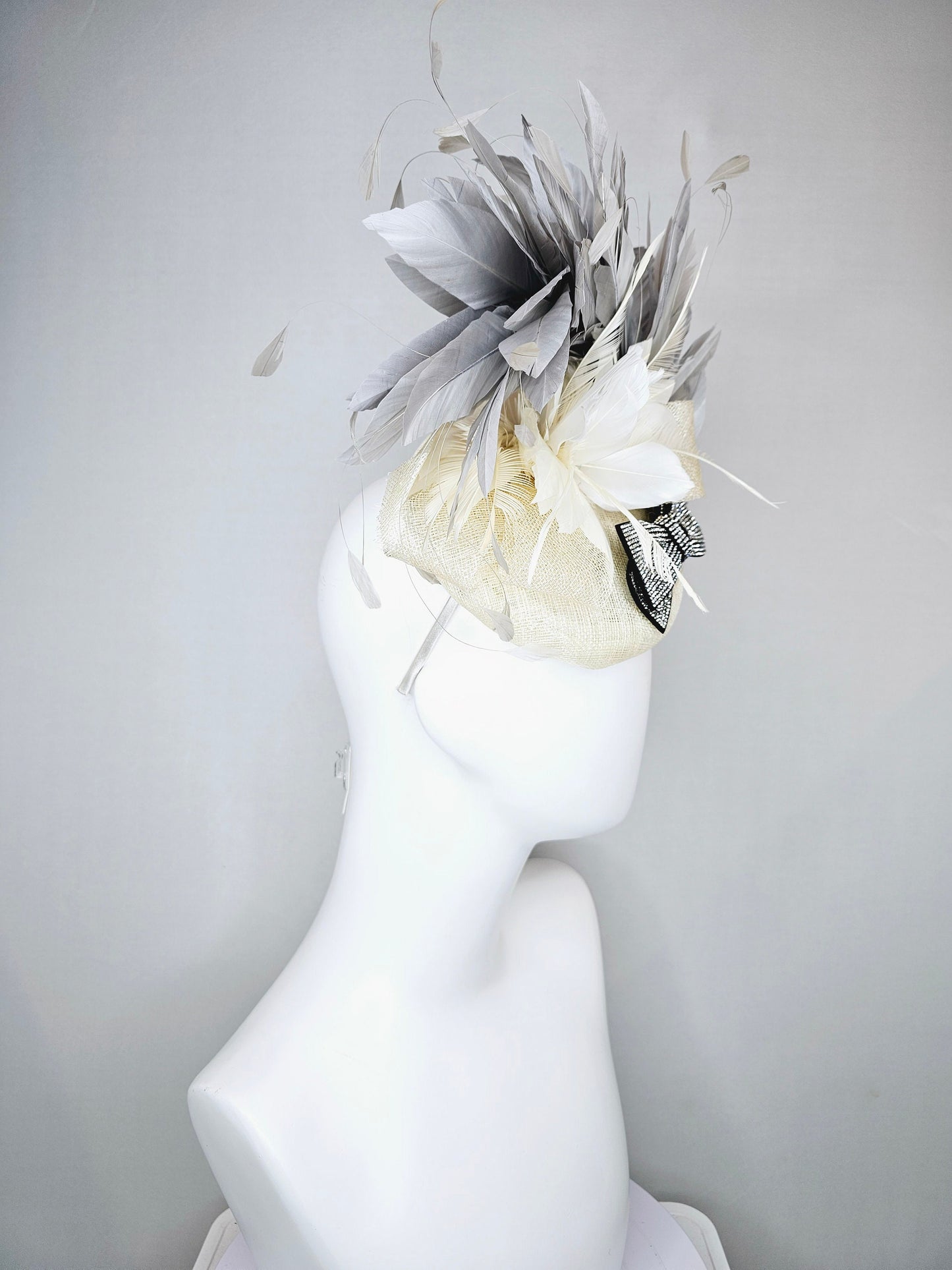 kentucky derby hat fascinator cream white ivory sinamay and feather flower with clear and black crystal bow decor with silver gray feathers