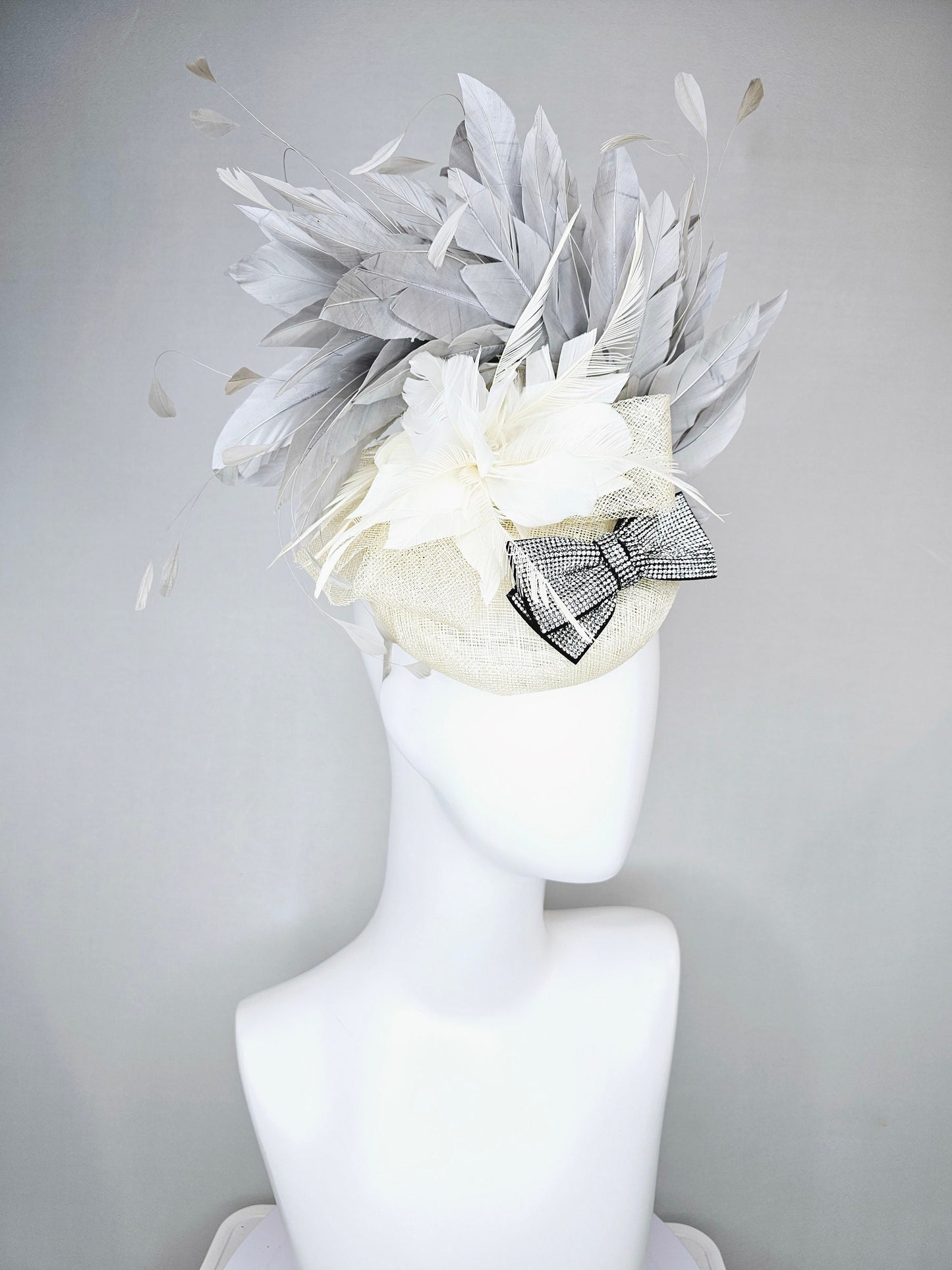 kentucky derby hat fascinator cream white ivory sinamay and feather flower with clear and black crystal bow decor with silver gray feathers