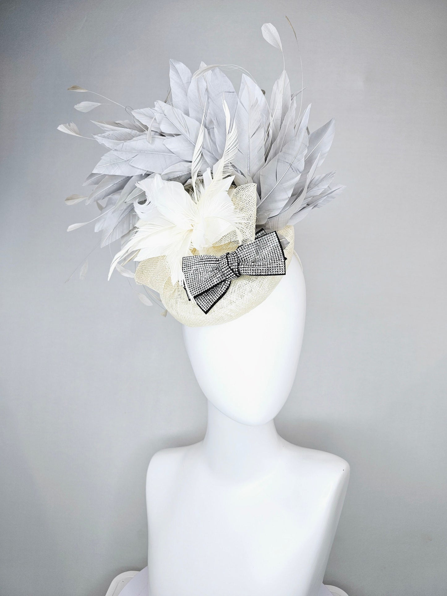 kentucky derby hat fascinator cream white ivory sinamay and feather flower with clear and black crystal bow decor with silver gray feathers