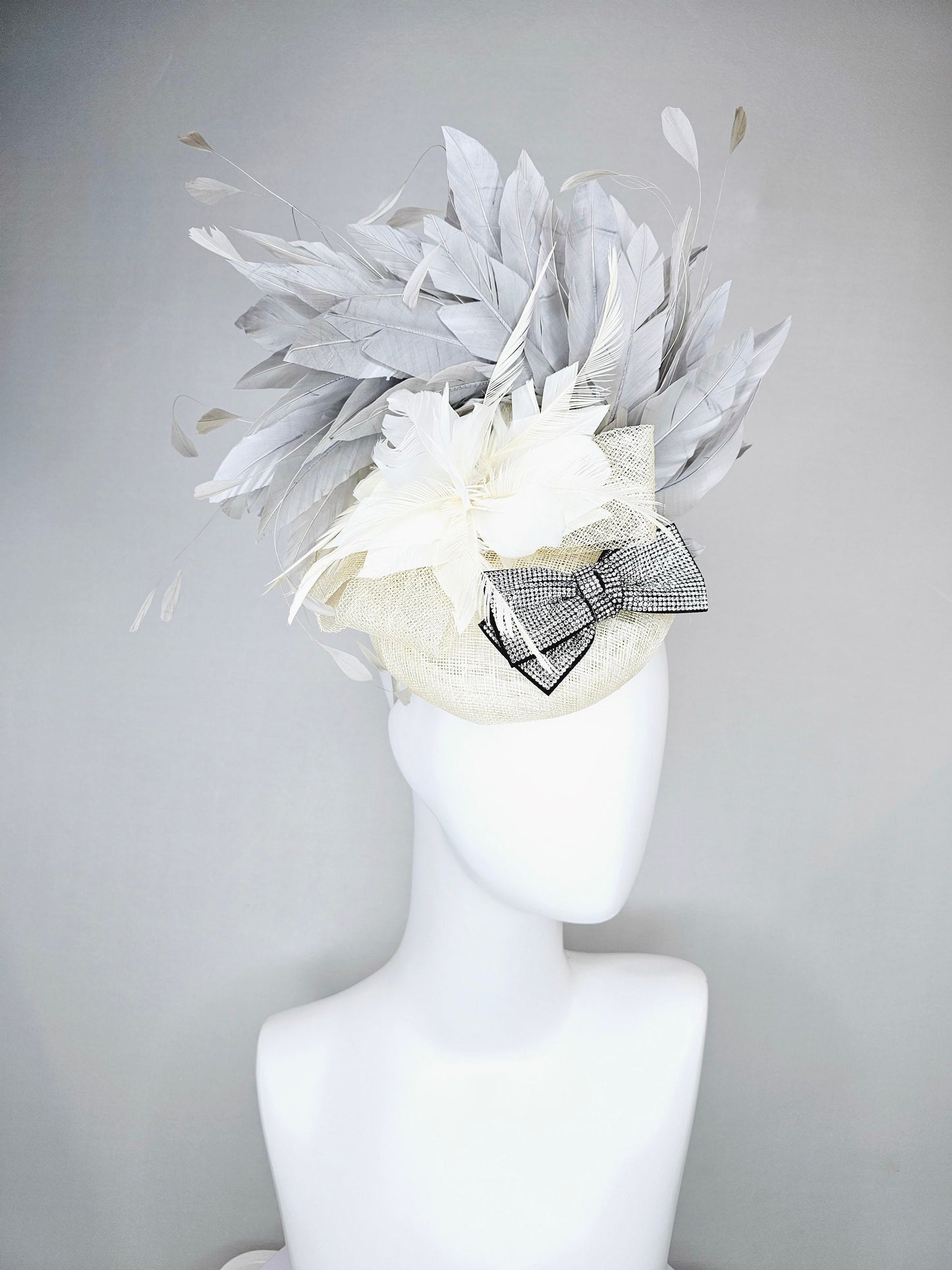 kentucky derby hat fascinator cream white ivory sinamay and feather flower with clear and black crystal bow decor with silver gray feathers