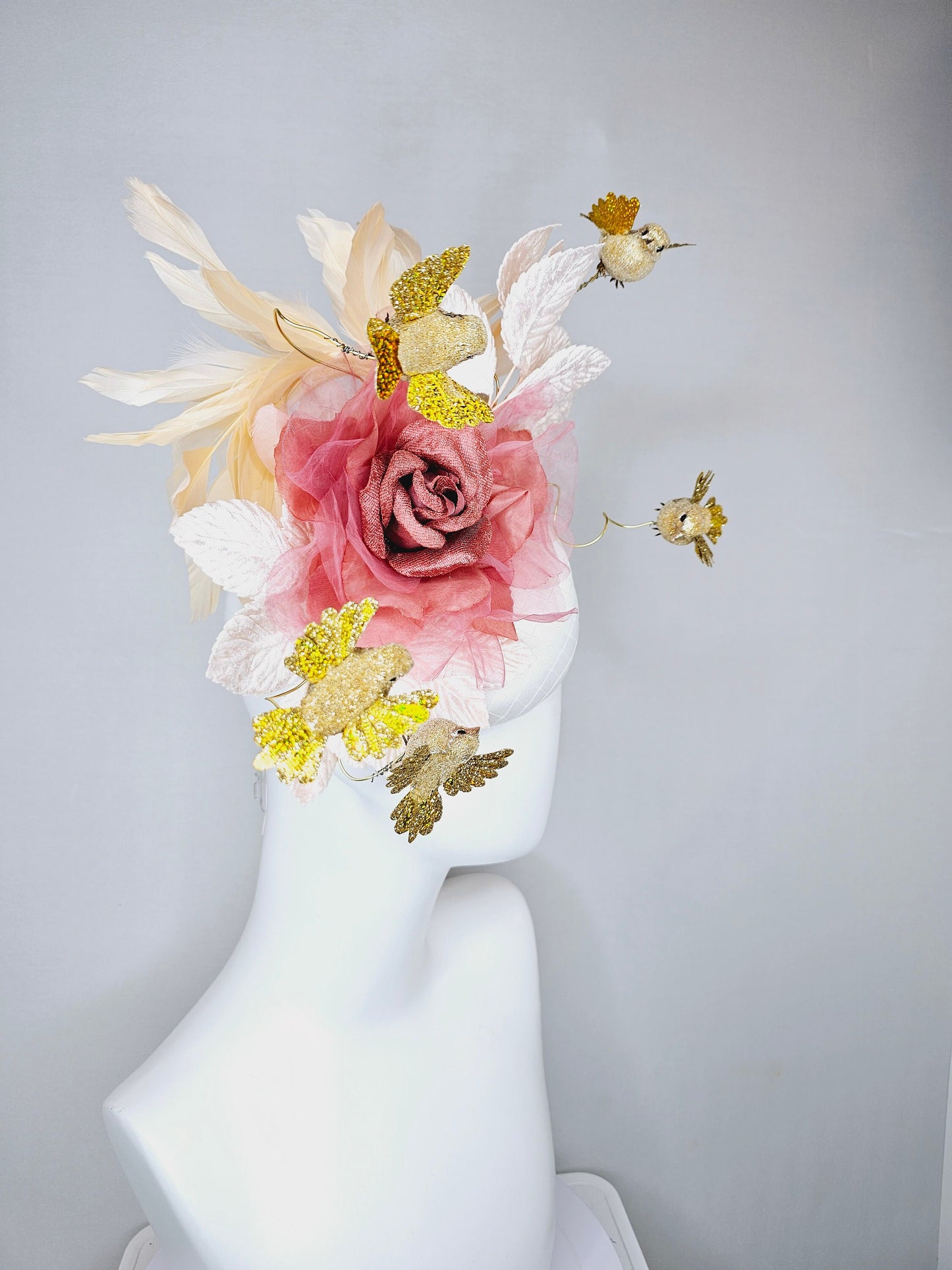 kentucky derby hat fascinator white satin base with netting dusty rose gold mauve pink rose  white blush velvet leaves gold flying birds