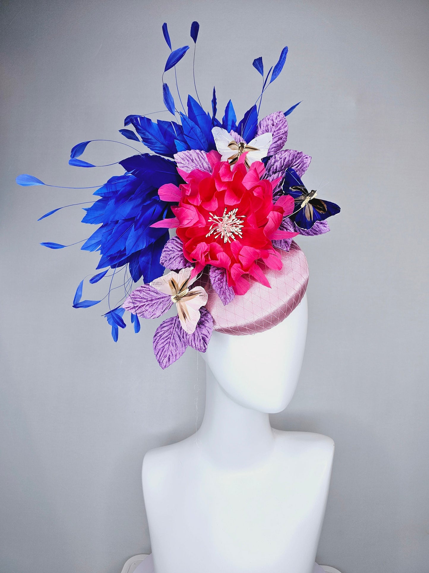 kentucky derby hat fascinator light pink blush satin pink feather flower royal blue feather purple leaves and blue white butterflies