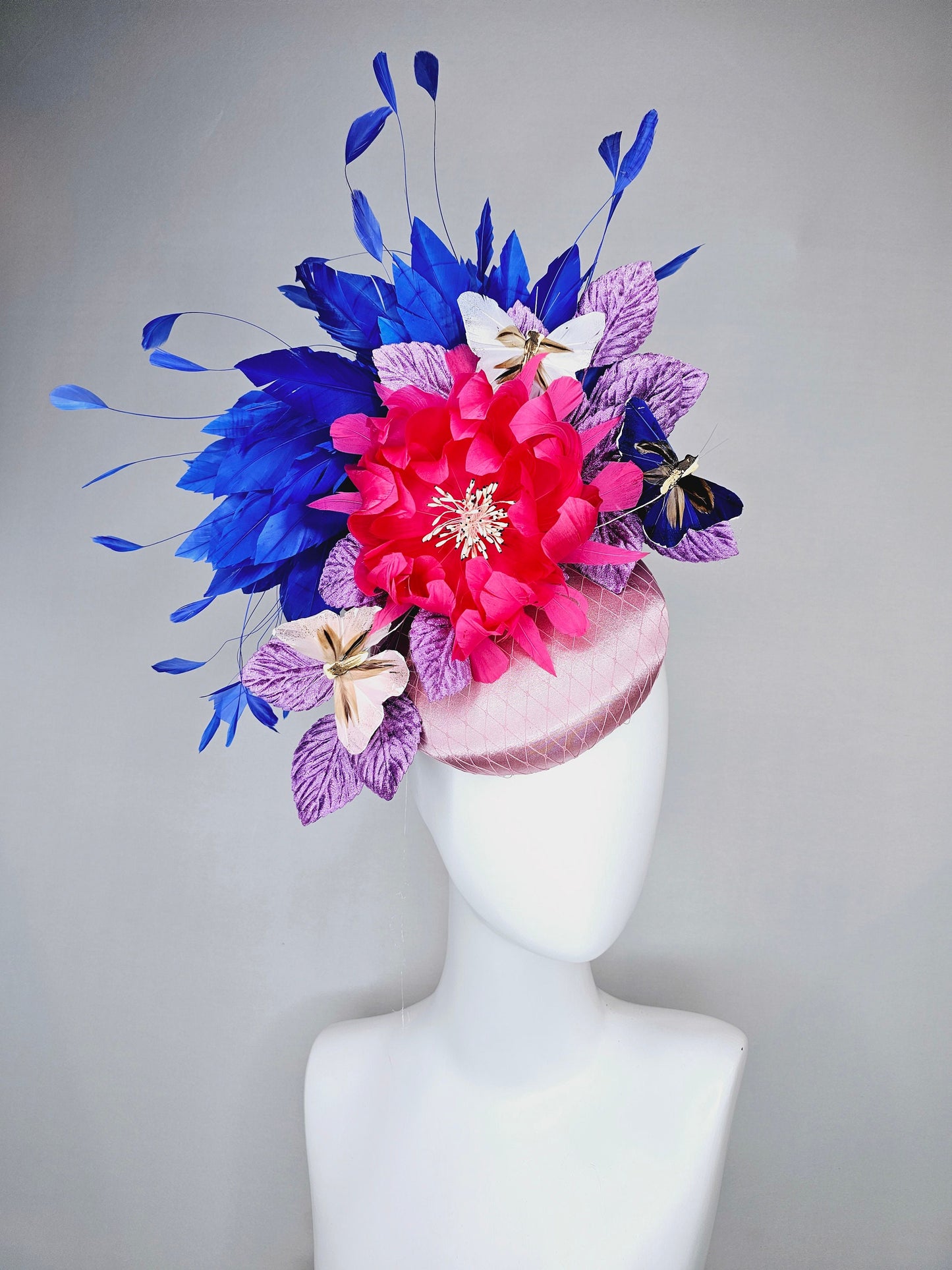 kentucky derby hat fascinator light pink blush satin pink feather flower royal blue feather purple leaves and blue white butterflies