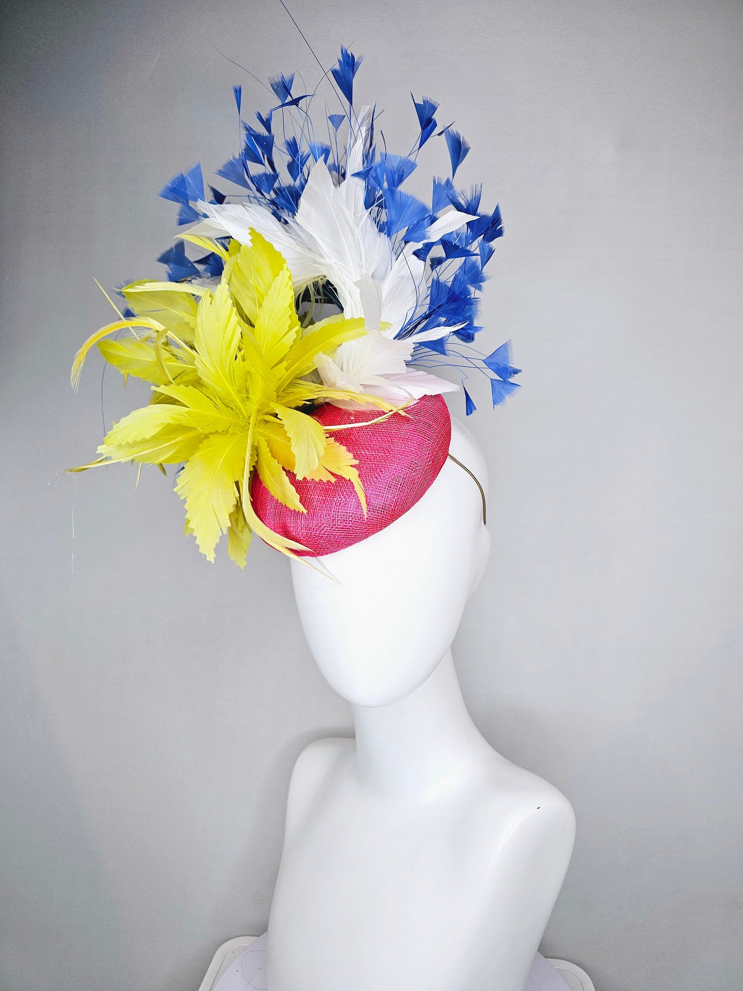 kentucky derby hat fascinator pink sinamay with chartreuse yellow feathers and blue and white feathers