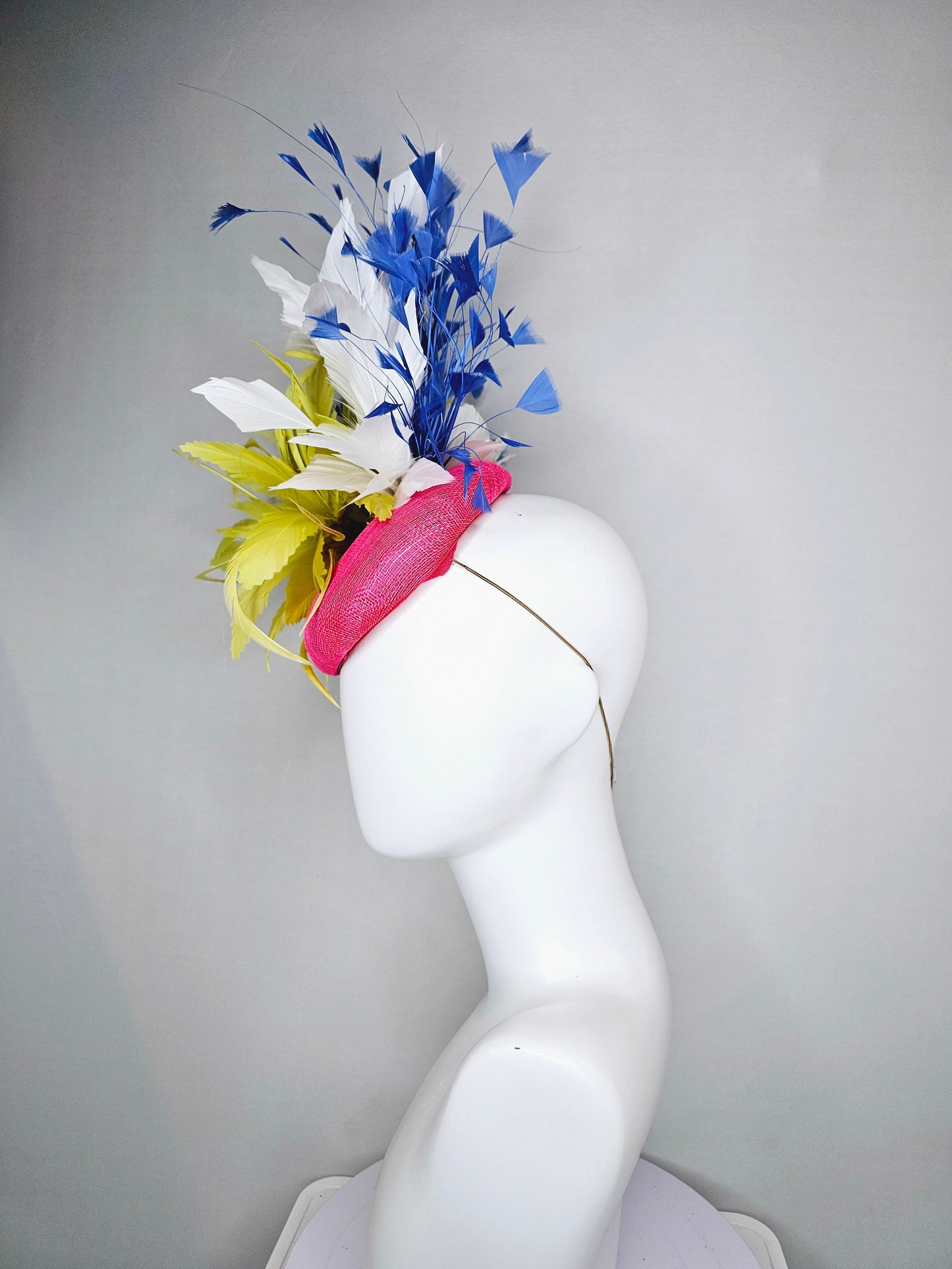 kentucky derby hat fascinator pink sinamay with chartreuse yellow feathers and blue and white feathers