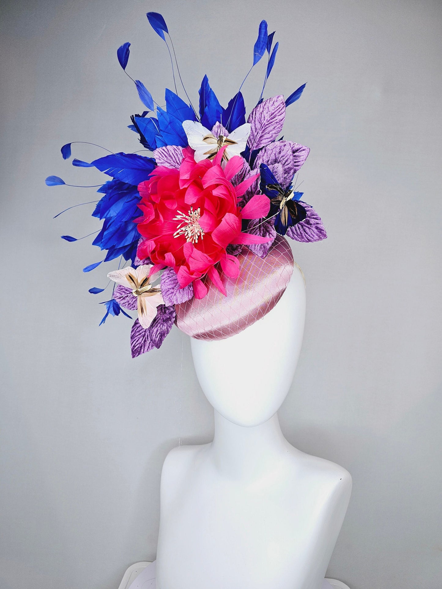 kentucky derby hat fascinator light pink blush satin pink feather flower royal blue feather purple leaves and blue white butterflies