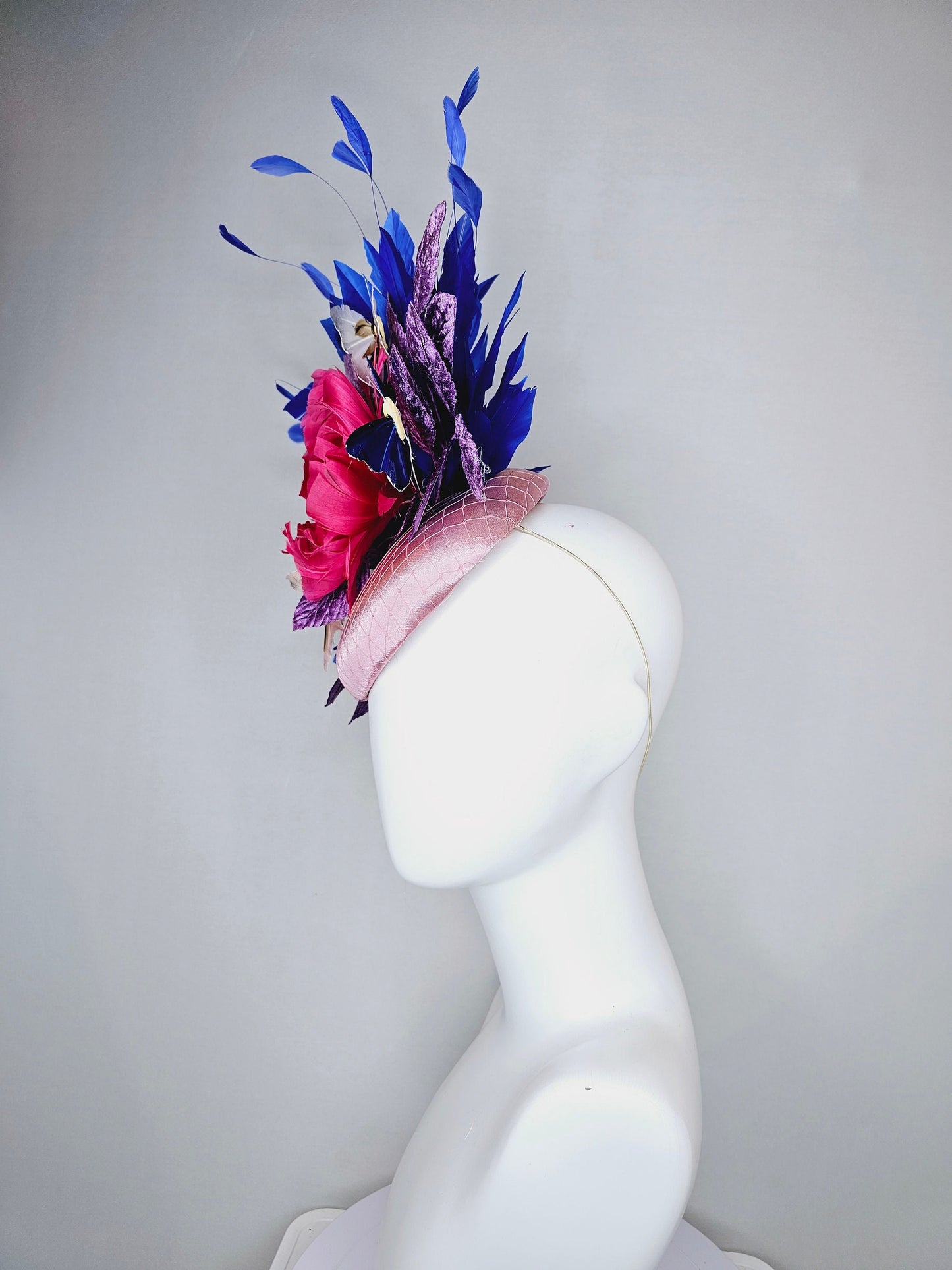 kentucky derby hat fascinator light pink blush satin pink feather flower royal blue feather purple leaves and blue white butterflies