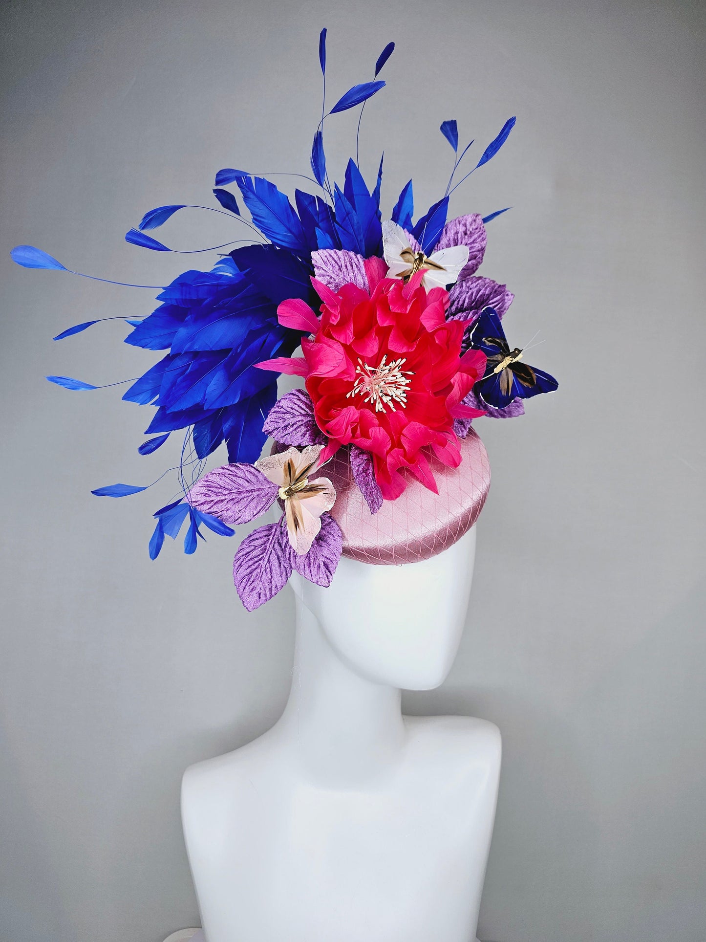 kentucky derby hat fascinator light pink blush satin pink feather flower royal blue feather purple leaves and blue white butterflies