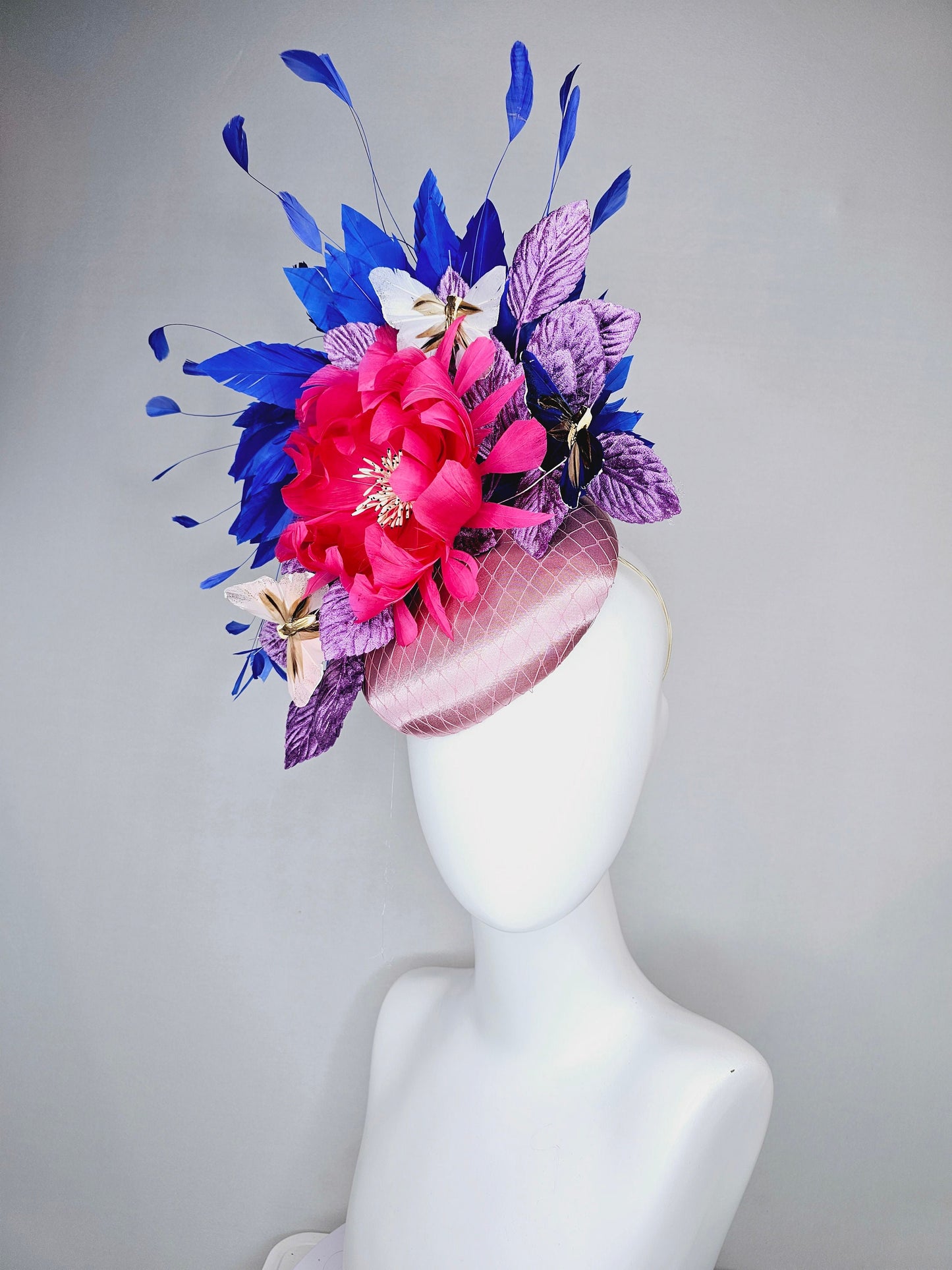 kentucky derby hat fascinator light pink blush satin pink feather flower royal blue feather purple leaves and blue white butterflies