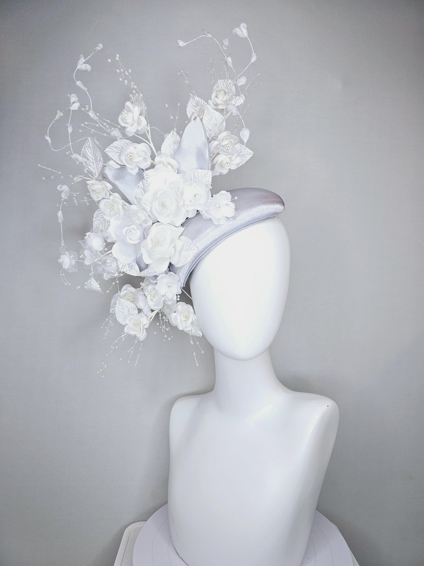 kentucky derby hat fascinator silver gray satin with ivory white satin flowers, white velvet leaves with decorative pearl strings