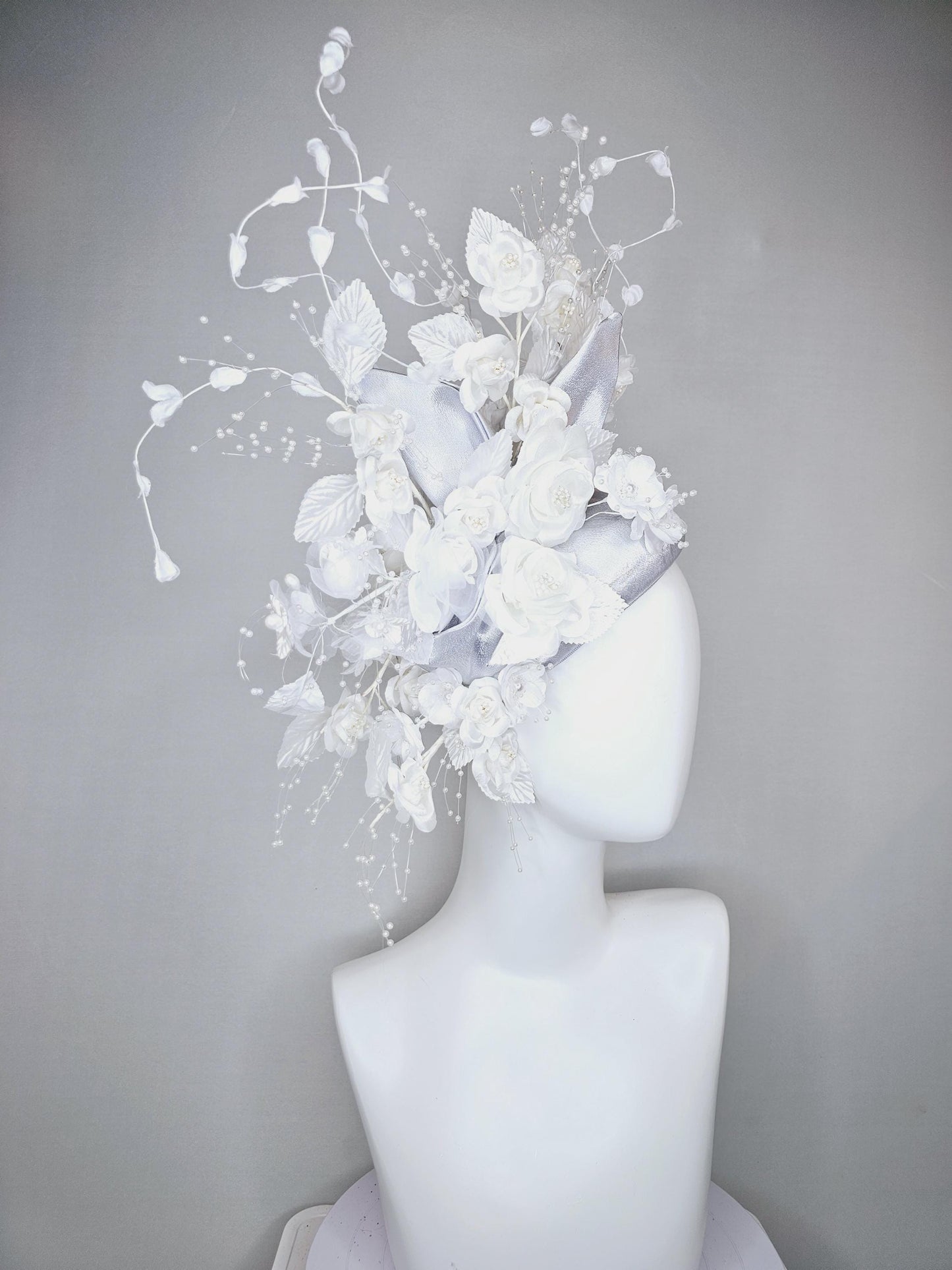 kentucky derby hat fascinator silver gray satin with ivory white satin flowers, white velvet leaves with decorative pearl strings