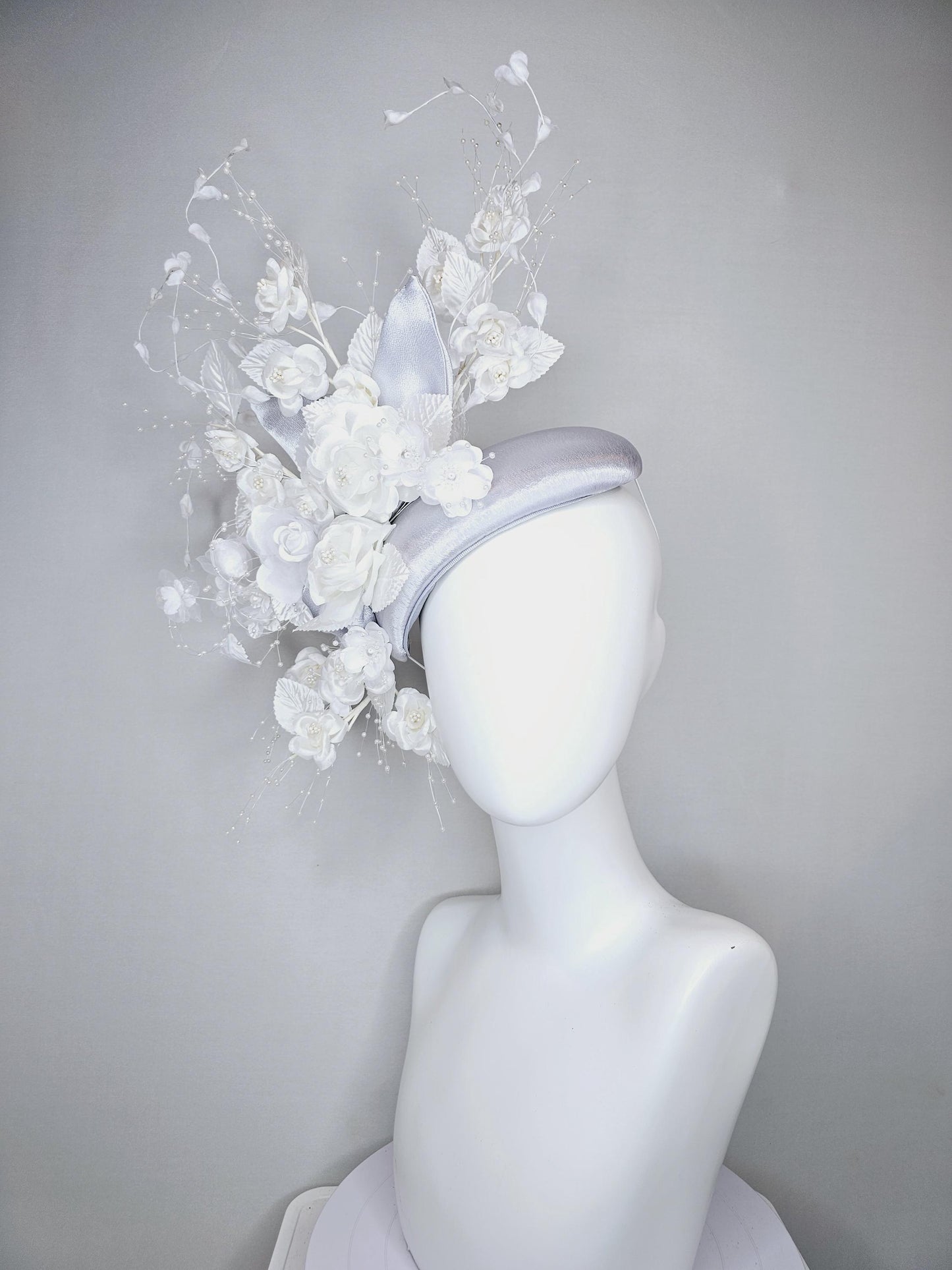 kentucky derby hat fascinator silver gray satin with ivory white satin flowers, white velvet leaves with decorative pearl strings