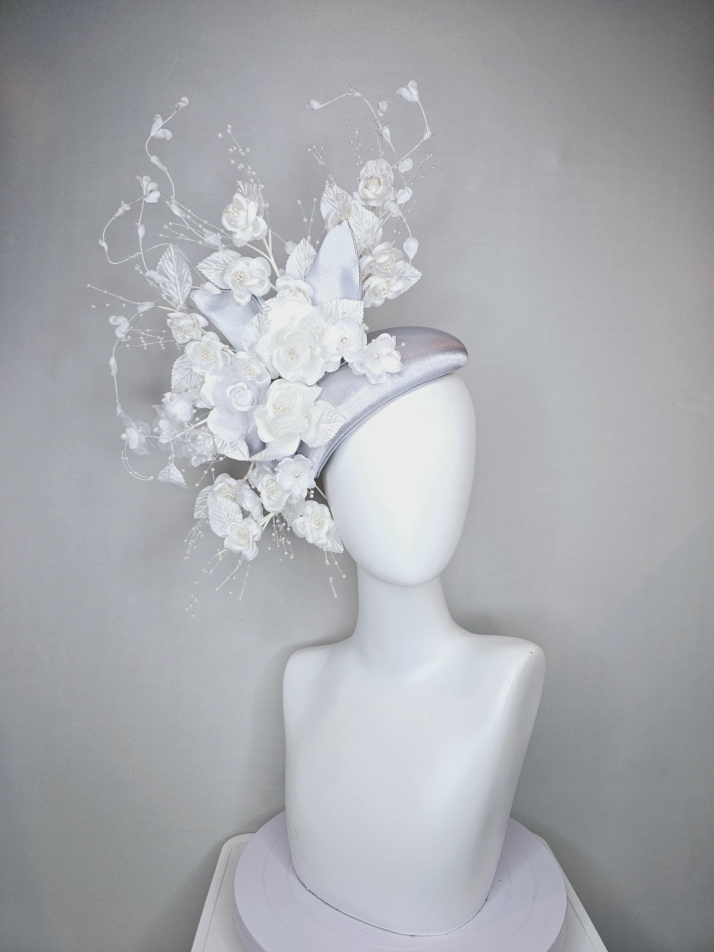 kentucky derby hat fascinator silver gray satin with ivory white satin flowers, white velvet leaves with decorative pearl strings