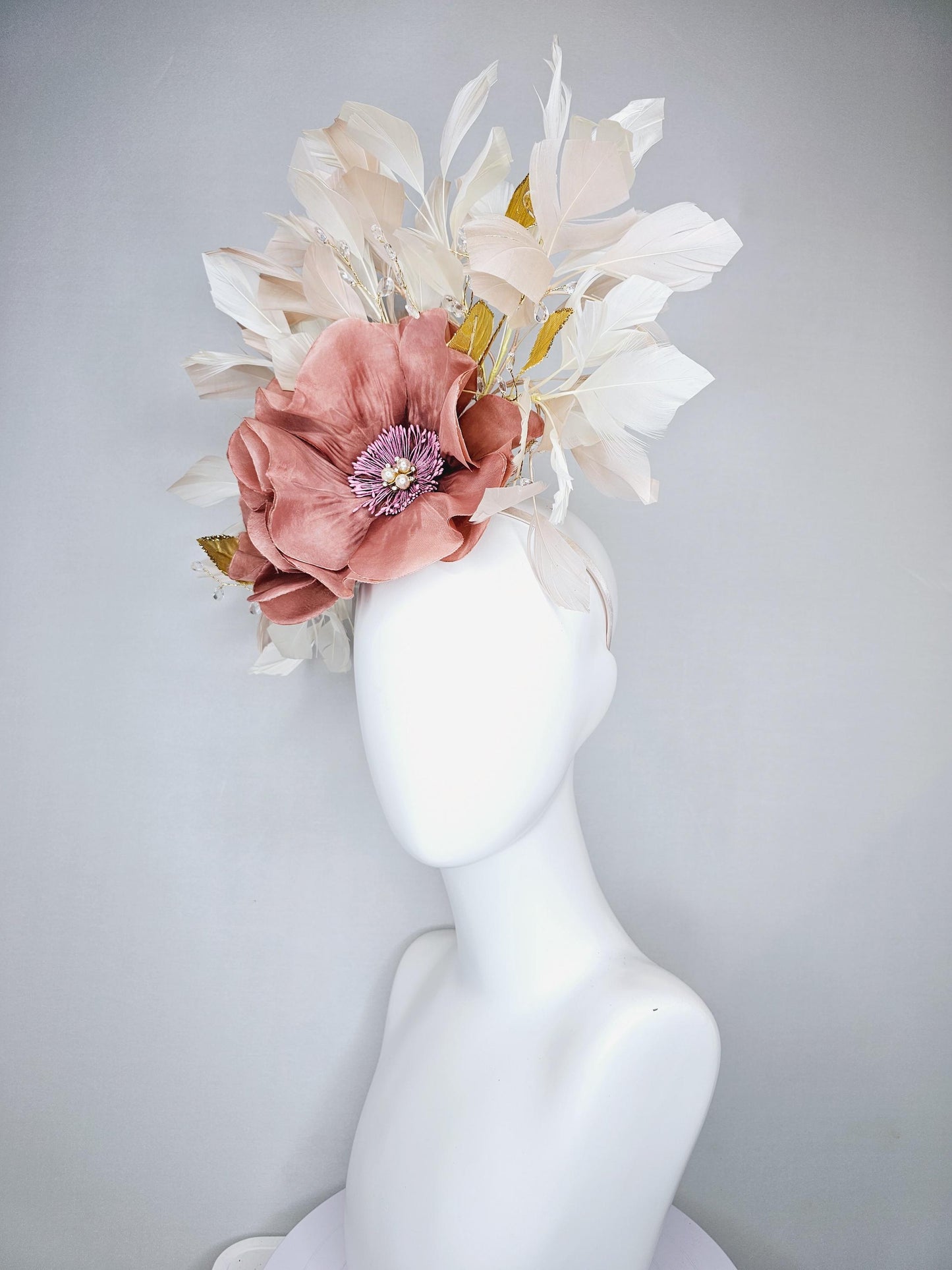 kentucky derby hat fascinator dusty rose gold pink flowers with pearls core and gold leaves, tear drop crystals stems and ivory feathers