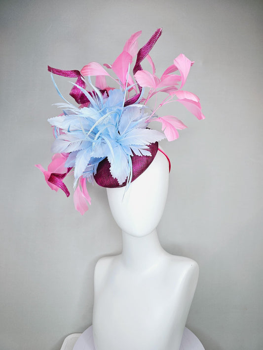 kentucky derby hat fascinator dark fuchsia purple sinamay with large light blue feather flower and light pink feathers with sinamay curls