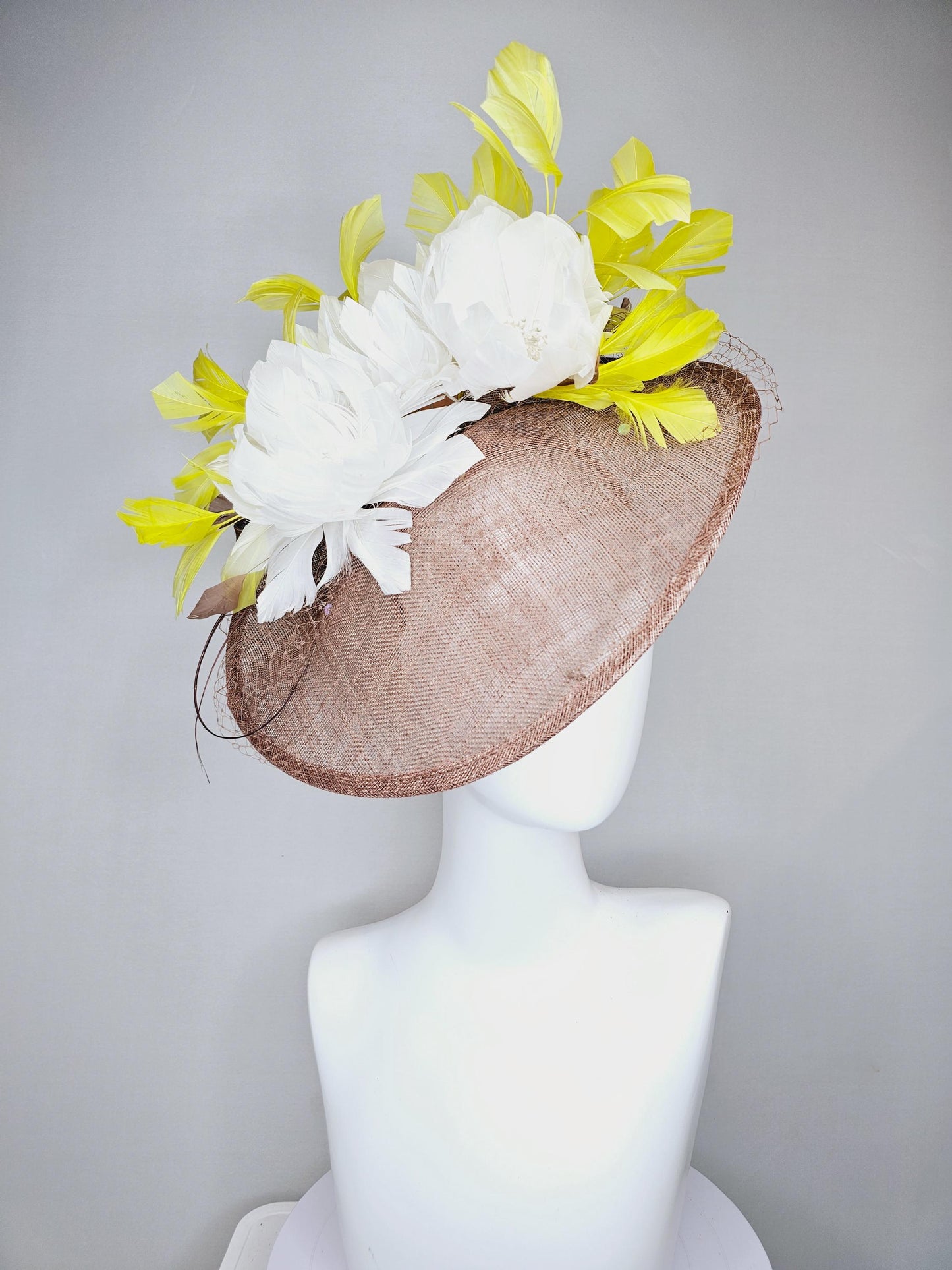 kentucky derby hat fascinator taupe brown sinamay saucer with netting, white fluffy feather flowers and yellow branching feathers