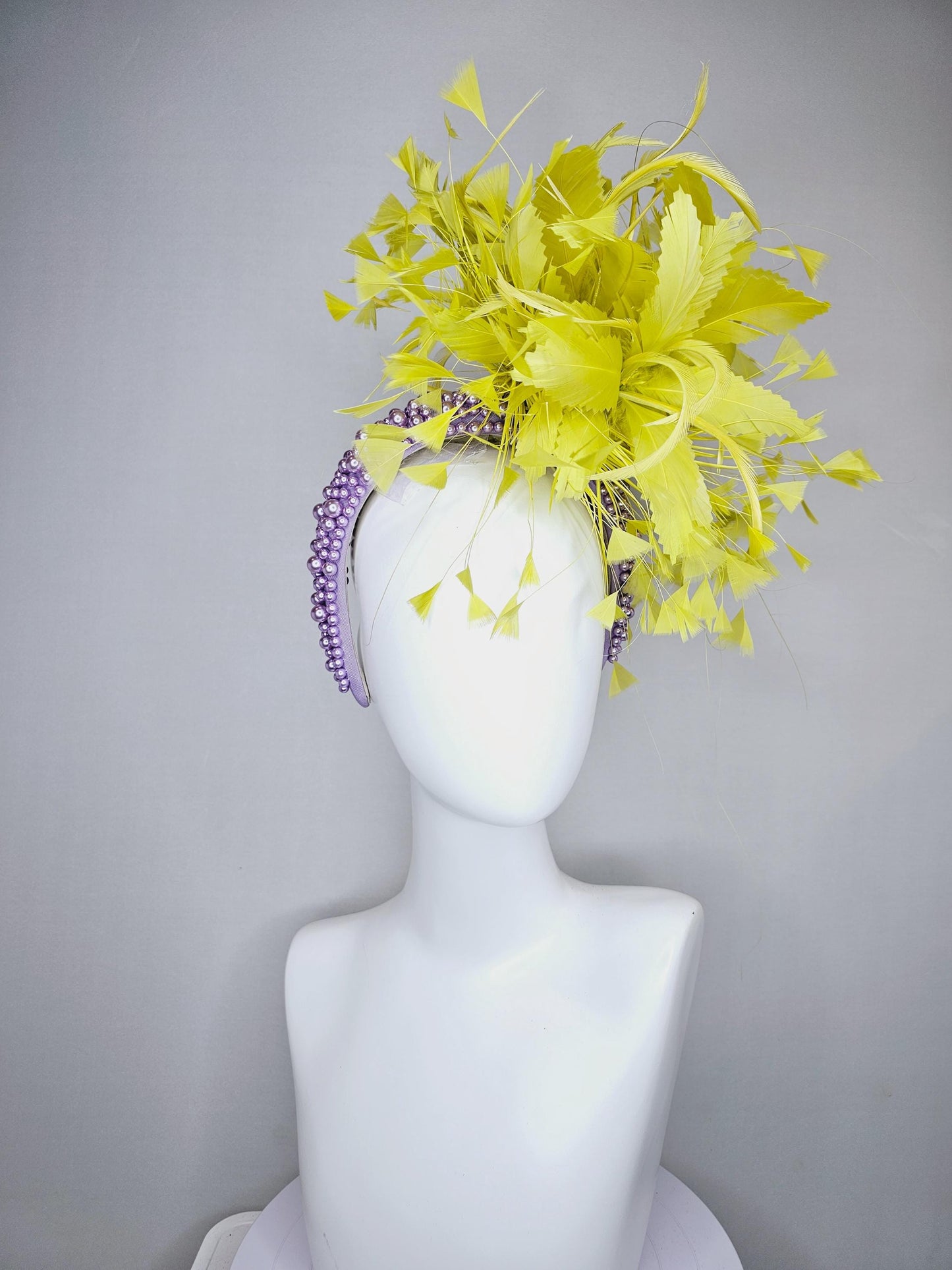 kentucky derby hat fascinator lavender purple pearl beaded headband with bright yellow feather flowers and branching yellow feathers